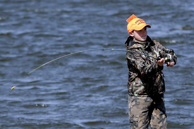 Evan Carter, 13, from Baldwin, Pa., casts a line at Lake Arthur in Moraine State Park as he fishes with his father during the Pennsylvania Fish and Boat Commision's Youth Mentor fishing program on Saturday, April 8, 2017, in Portersville, Pa. The program permits youth under 16 to join a mentor with a current fishing license and trout permit to fish before the regular Pennsylvania trout season opens on April 15, 2017.