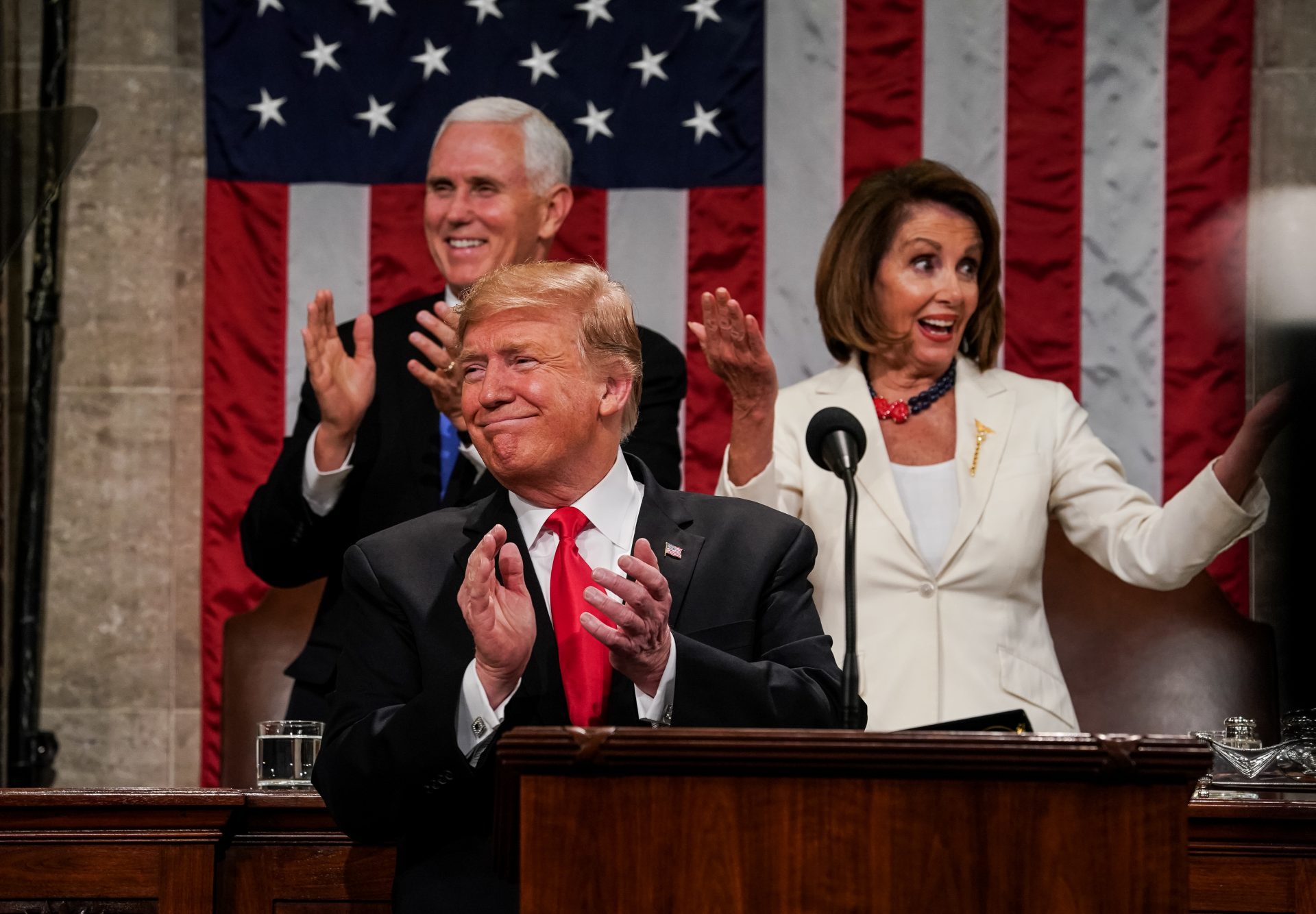 President Trump, Speaker Nancy Pelosi and Vice President Pence applaud during the State of the Union address on Feb. 5, 2019.