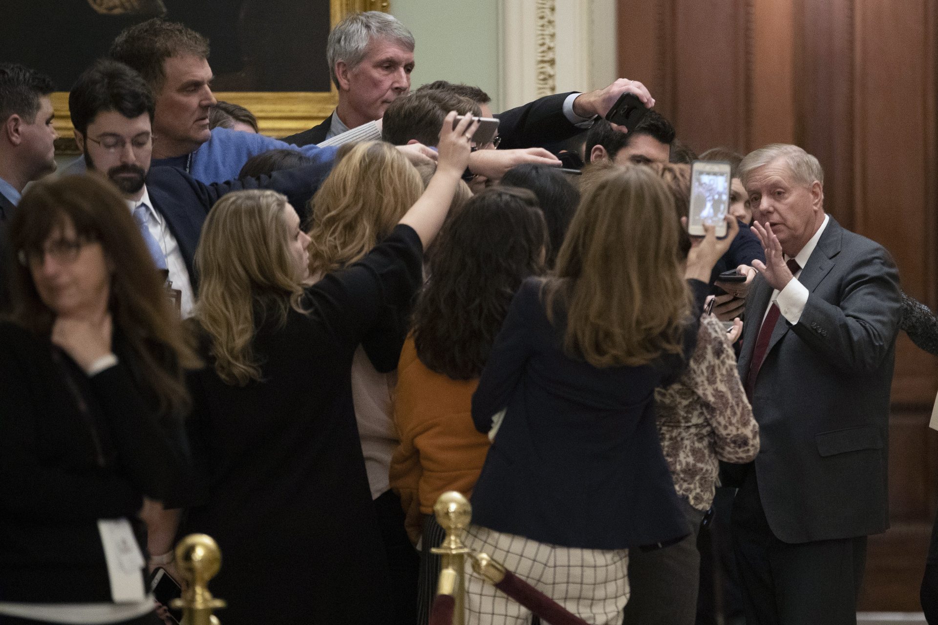 Sen. Lindsey Graham, R-S.C., talks to the media outside the Senate chamber during the impeachment trial of President Donald Trump at the Capitol, Thursday, Jan. 23, 2020, in Washington.