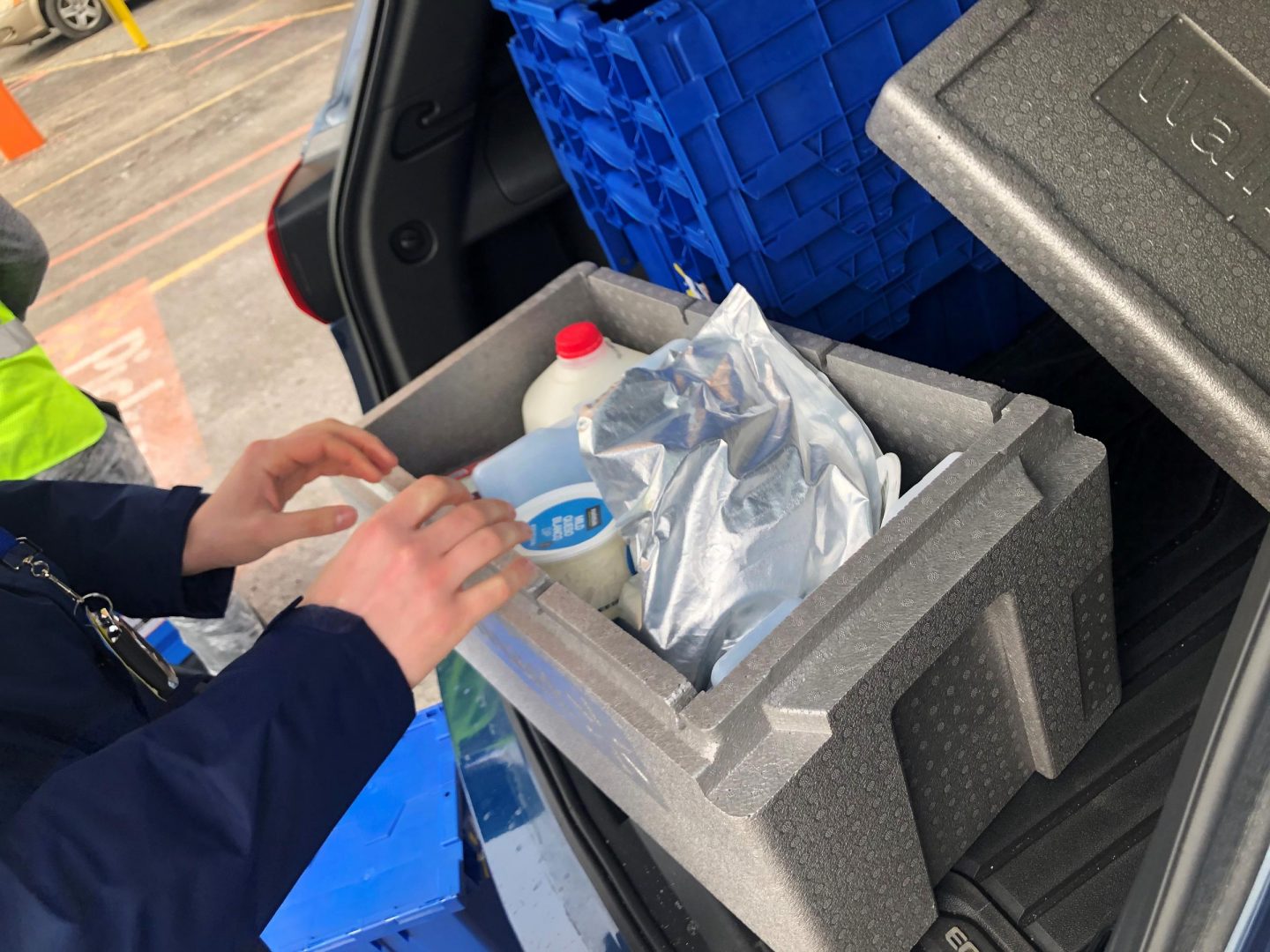 Walmart InHome Delivery associate Nick Burmaster loads groceries into the car he'll take to make deliveries on Thursday, January 24, 2020.