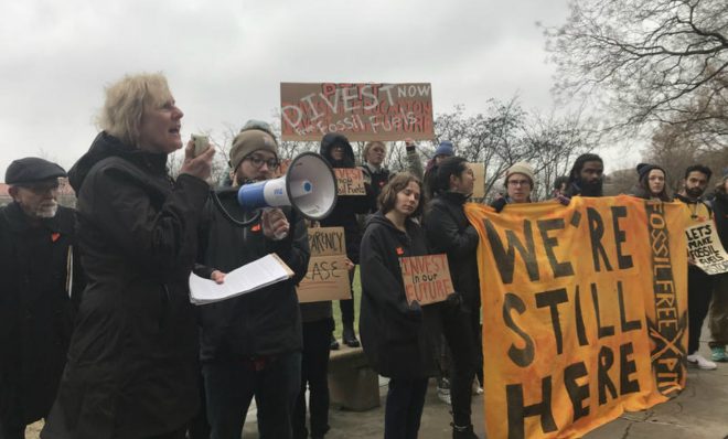 Pitt alum Ellen Dorsey, left, tells a crowd of students Tuesday that she supports their demands for the University of Pittsburgh to divest from fossil fuels.