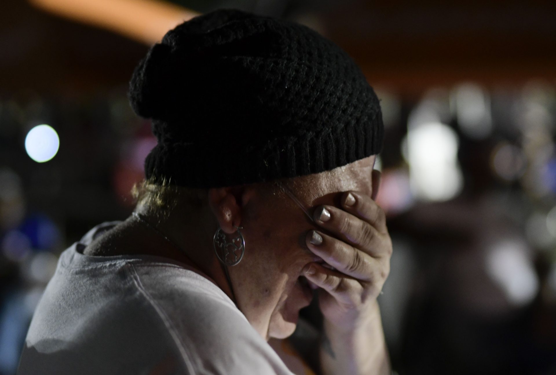 Maritza QuiÃ±ones Rodriguez, 51 years-old, cries as she and other neighbors remain outdoors using camping tents and portable lights for fear of possible aftershocks after a 6.4-magnitude earthquake struck in Guanica, Puerto Rico, Tuesday, Jan. 7, 2020. The quake was followed by a series of strong aftershocks, part of a 10-day series of temblors spawned by the grinding of tectonic plates along three faults beneath southern Puerto Rico.