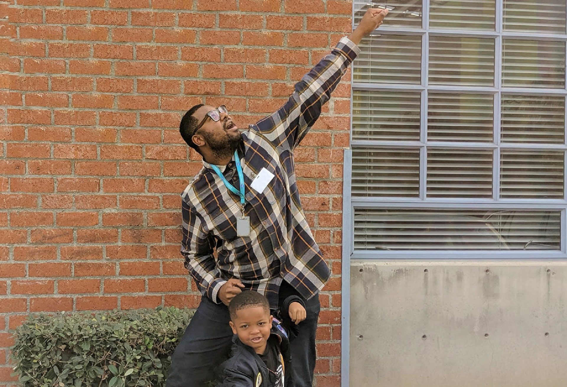 Six-year-old Jerry Morrison and his uncle Joey Jefferson, a NASA engineer, talk about their mutual love for learning about space, in November 2019 at their StoryCorps interview in Los Angeles.