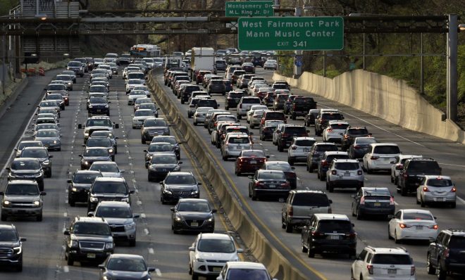 Rush-hour traffic heads west, right, and east, left, along the Schuylkill Expressway Wednesday, April 10, 2019 in Philadelphia.