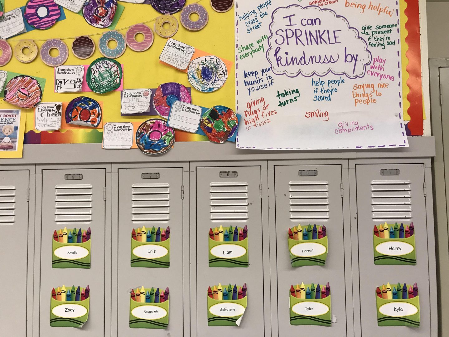 School lockers and art are shown.