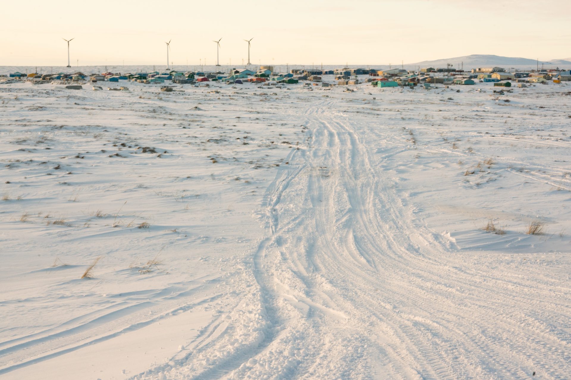 ATV and snow machine tracks lead from the airstrip to the village in Toksook Bay. Census Bureau officials crossed the tundra by plane to reach the fishing village along the Bering Sea in January.