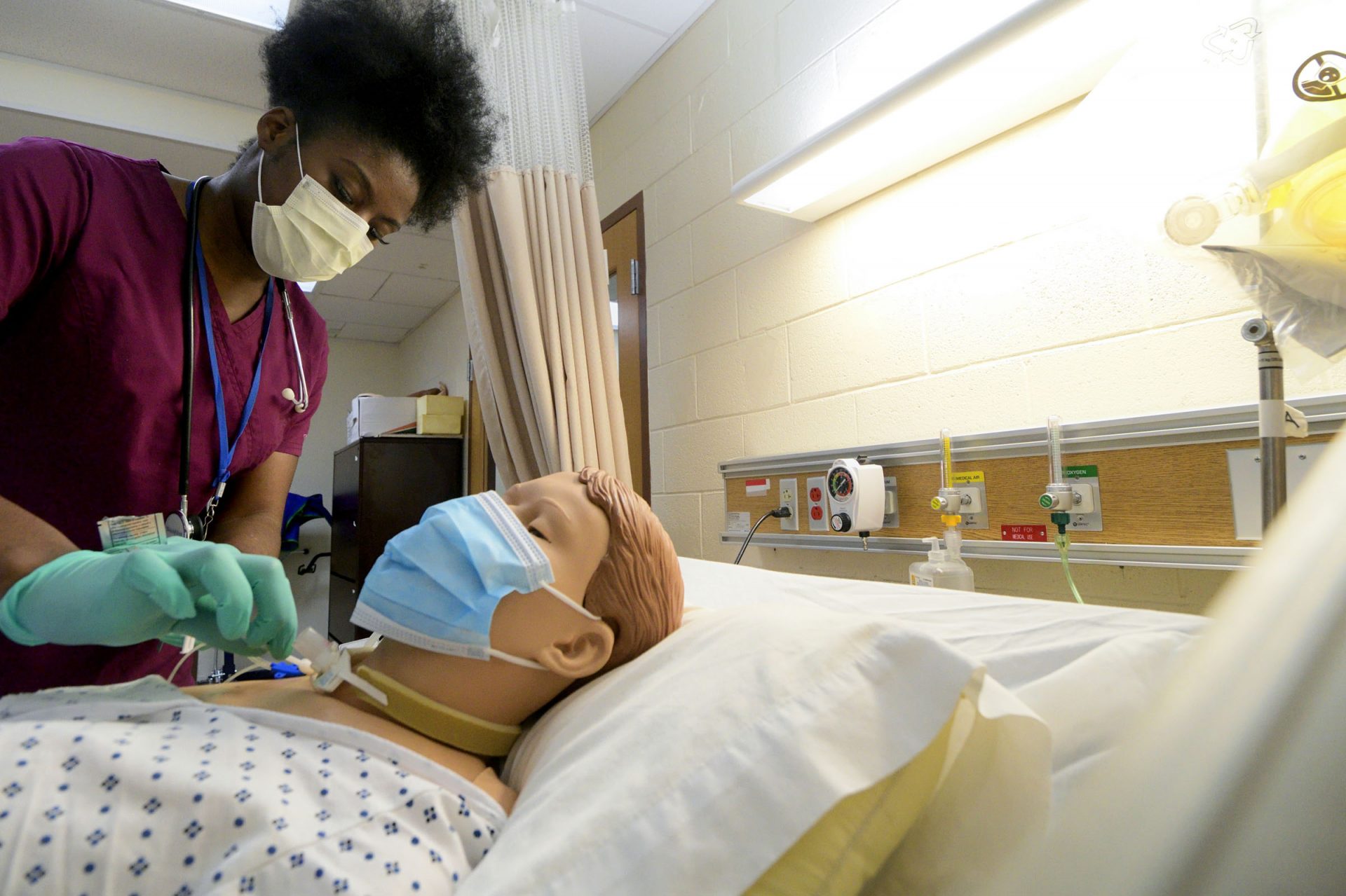Nicole Obisie attends to a mannequin in a training situation of the Delaware County Technical School Practical Nursing Program, in Broomall, PA, on January 28, 2020.