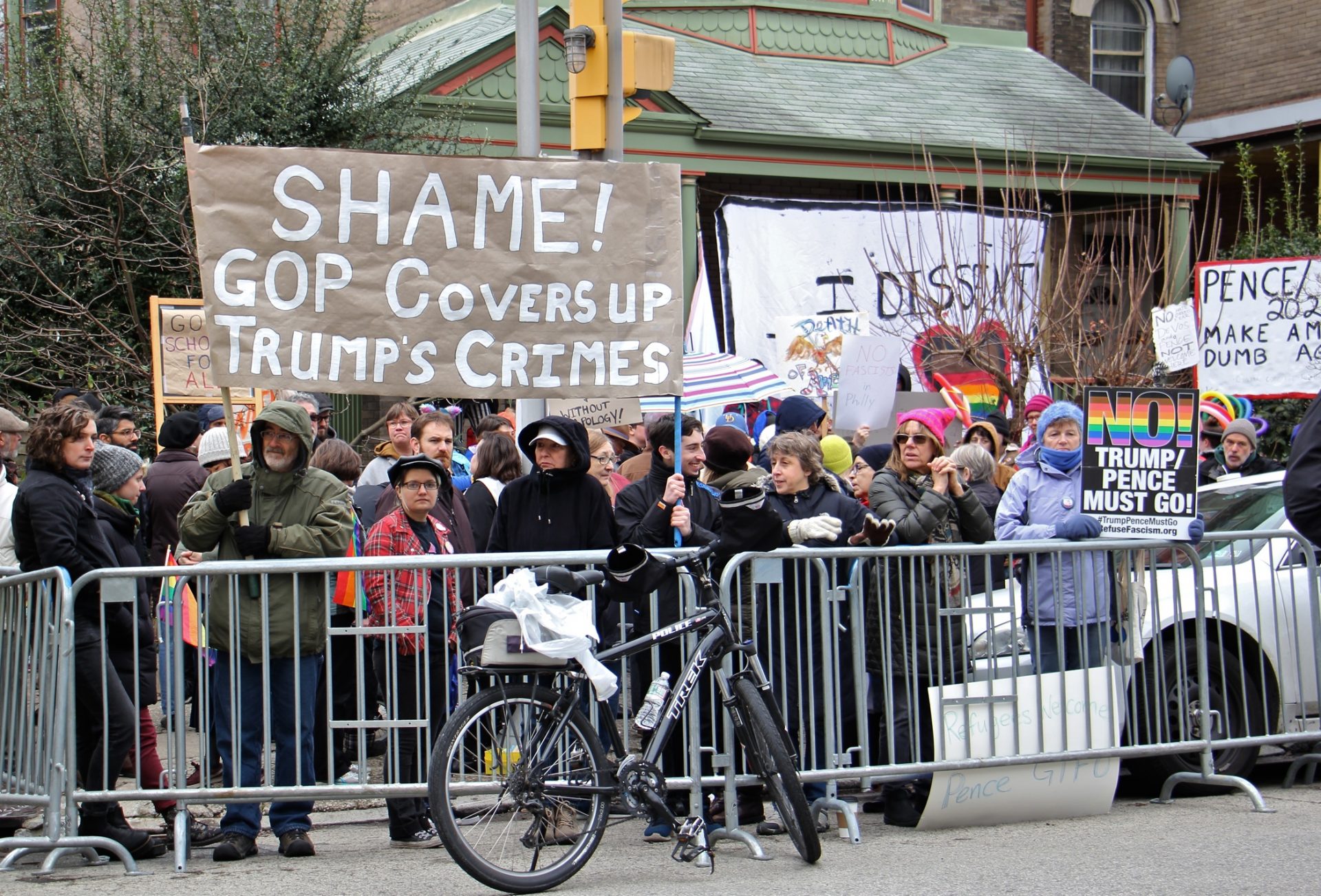 Protesters gather across the street from St. Francis de Sales school, where Vice President Mike Pence was speaking about school choice.
