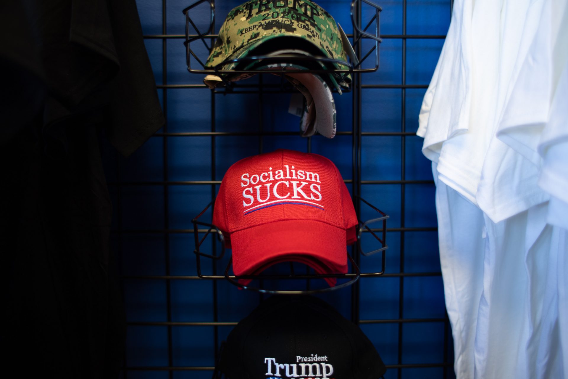 Merchandise for sale at Michael Domanico's "Trump Store" in Bensalem, PA includes baseball hats with phrases like "Socialism Sucks."