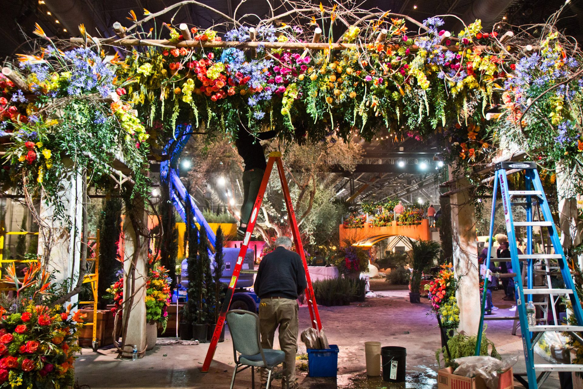 PHS staff work to finish the main exhibit of the Philadelphia Flower Show Thursday.