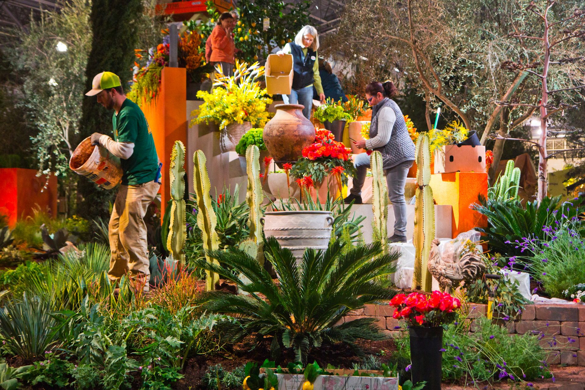 PHS staff work to finish the main exhibit of the Philadelphia Flower Show Thursday.