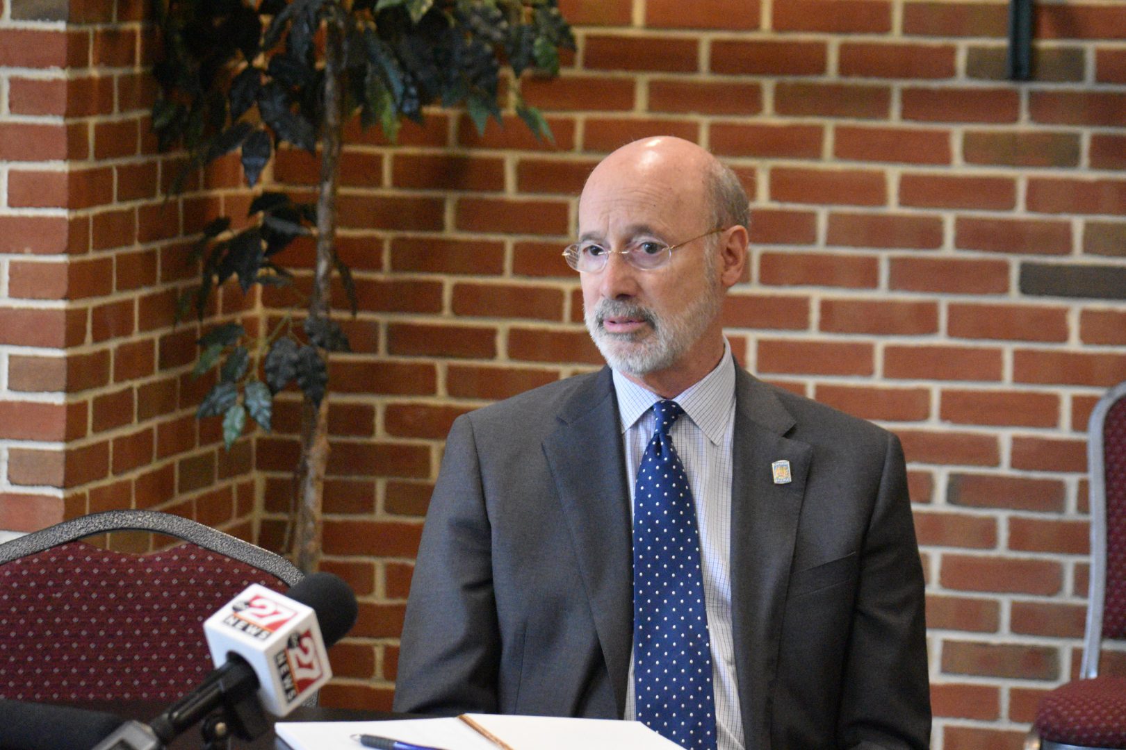 Gov. Tom Wolf listens during a discussion about college scholarships at Carlisle High School on Feb. 5, 2020