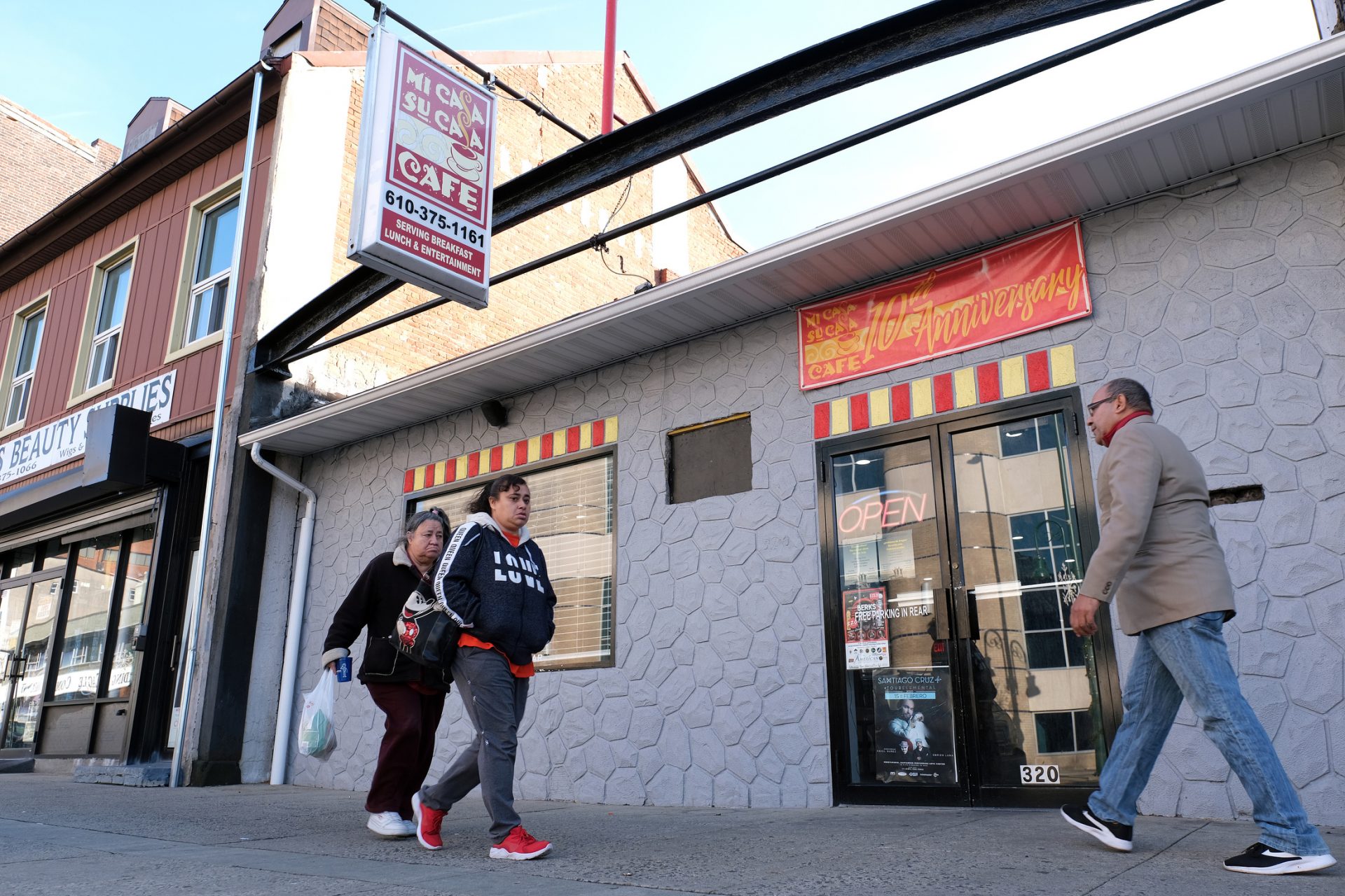 People walk past Mi Casa Su Casa on Jan. 15, 2020, on Penn Street in Reading, Pennsylvania.