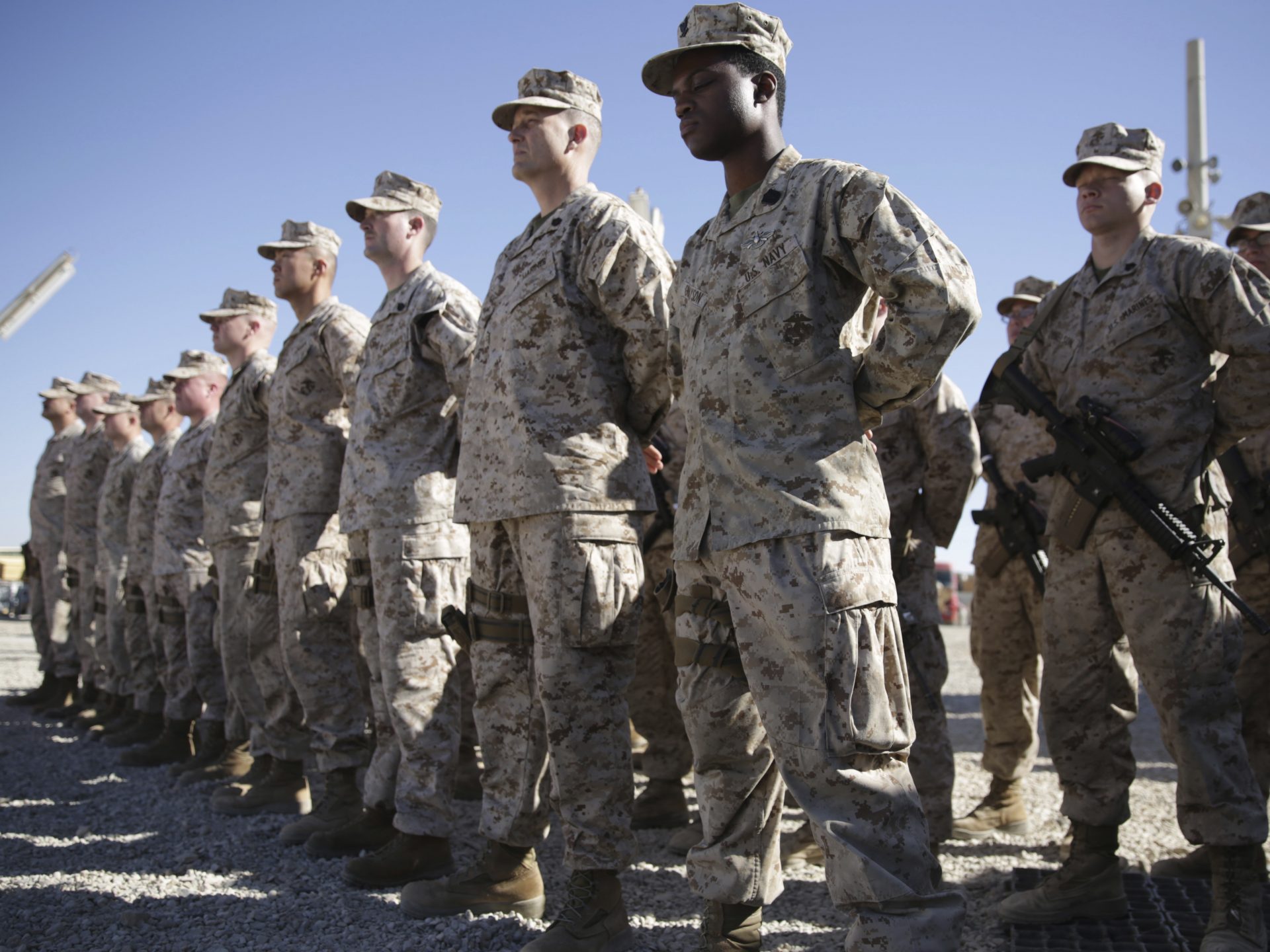 U.S. Marines stand guard during the change of command ceremony at Shorab military camp in Afghanistan's Helmand province in January 2018.