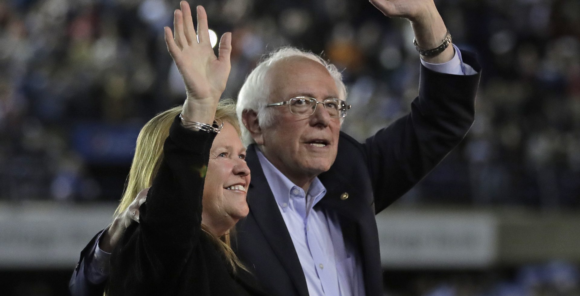 Democratic presidential candidate Sen. Bernie Sanders, I-Vt., waves with his wife, Jane, after his speech at a campaign event in Tacoma, Wash., on Feb. 17.