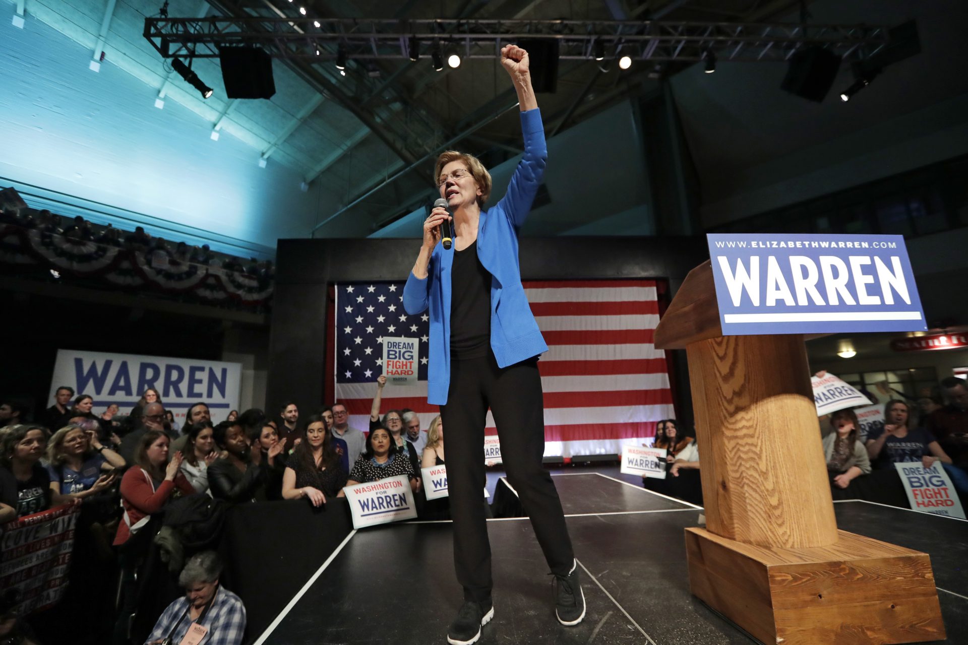 Sen. Elizabeth Warren makes a fist during a campaign event in Seattle, Wash. Washington state holds its nominating contest March 10, a week after Super Tuesday.