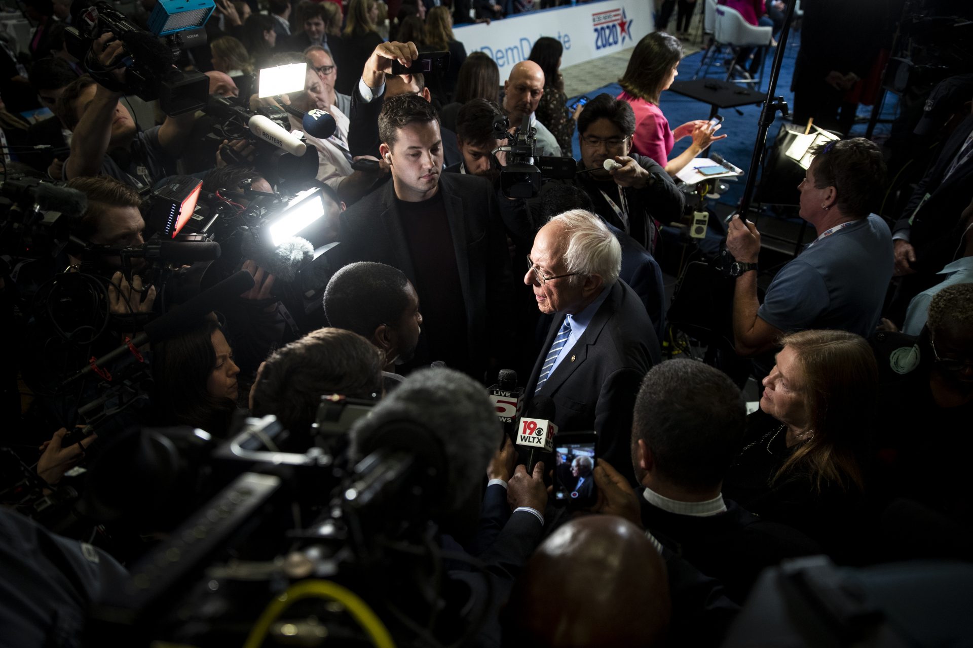 FILE - In this Tuesday, Feb. 25, 2020, file photo, Democratic presidential candidate Sen. Bernie Sanders, I-Vt., speaks with members of the media after a Democratic presidential primary debate in Charleston, S.C. As Sanders reaches out to black voters ahead of South Carolina's Saturday primary, seeking to cut into former Vice President Joe Biden's firewall of black support in the state, the Democratic front-runner's Jewish identity isn't much of a factor.