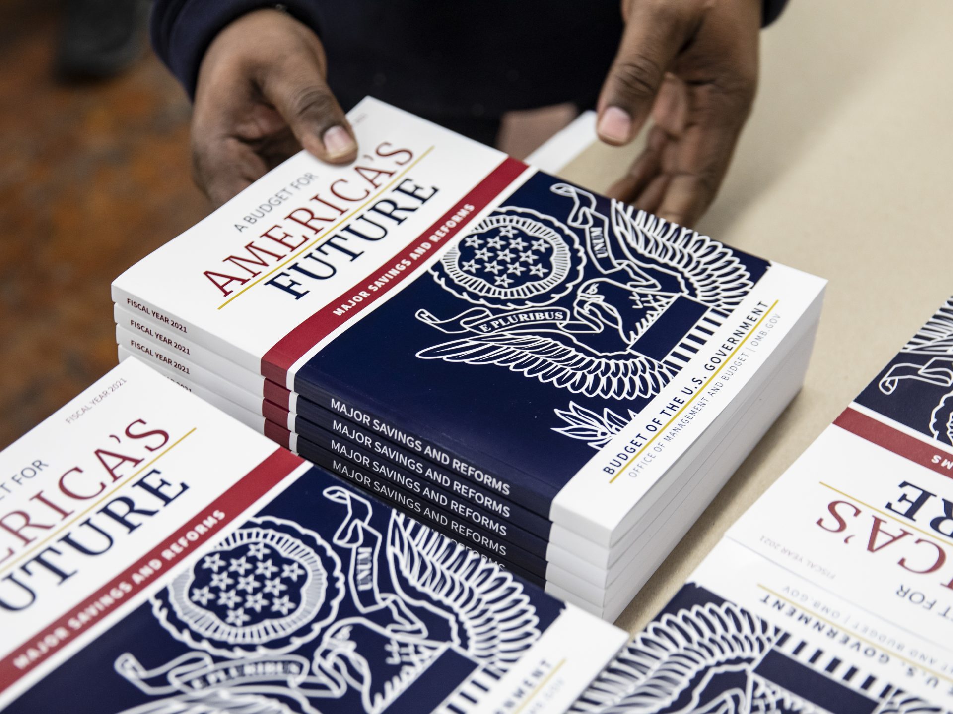 Hot off the presses: The president's budget proposal for fiscal 2021 at the Government Publishing Office. The election year proposals are unlikely to gain traction in the Democratic-controlled House of Representatives.