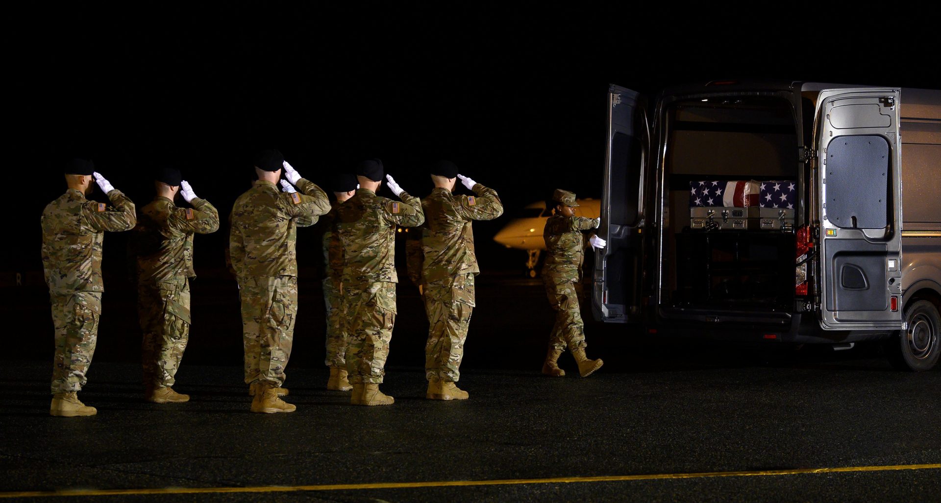 The transfers are a solemn ritual executed with precision by military professionals with all too much experience receiving the remains of the fallen.