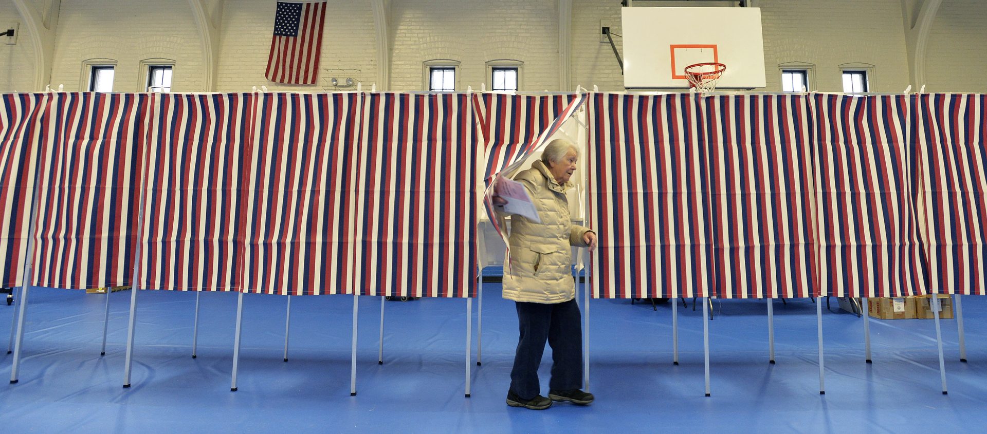 A voter leaves a polling booth at the Ward Five Community Center during the New Hampshire primary in Concord, N.H. on Tuesday. New Hampshire has served to reinforce or reset the Democratic primary race over the past five decades.