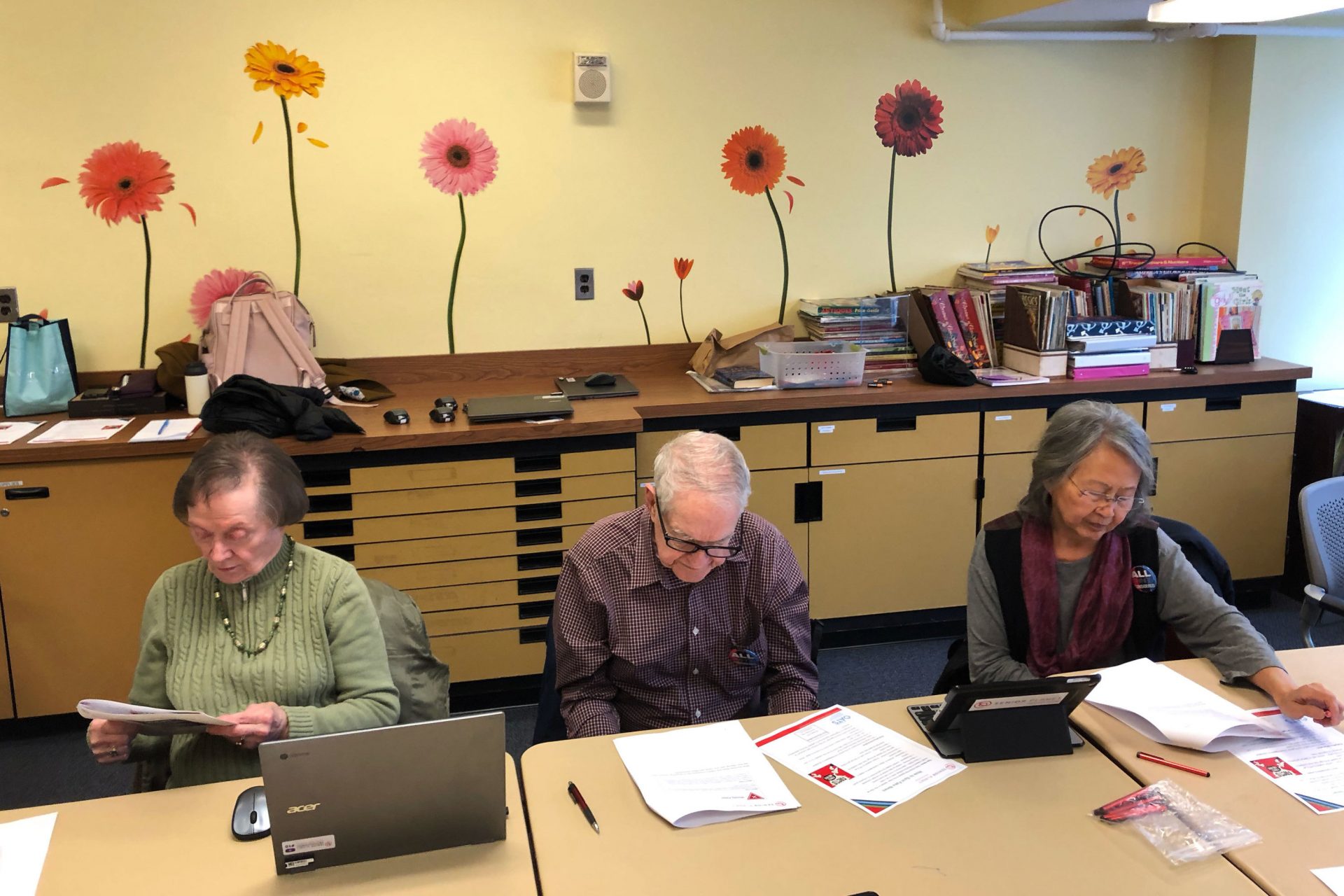 Seniors at the Schweinhaut Senior Center participate in a workshop on spotting fake news. The workshop is organized by the nonprofit Senior Planet.