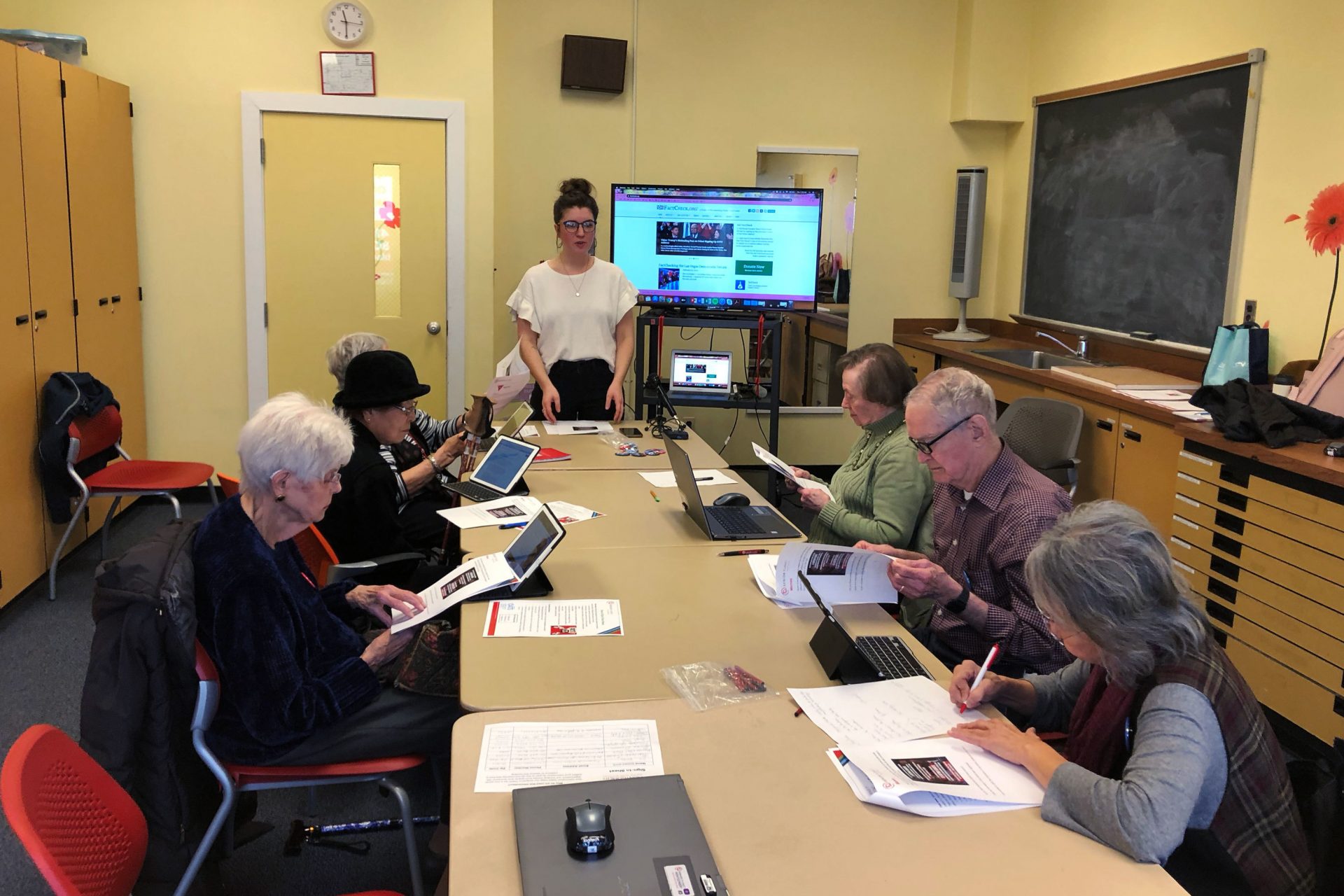 Bre Clark leads a workshop at the Schweinhaut Senior Center in Silver Spring, Md., called "How to Spot Fake News."