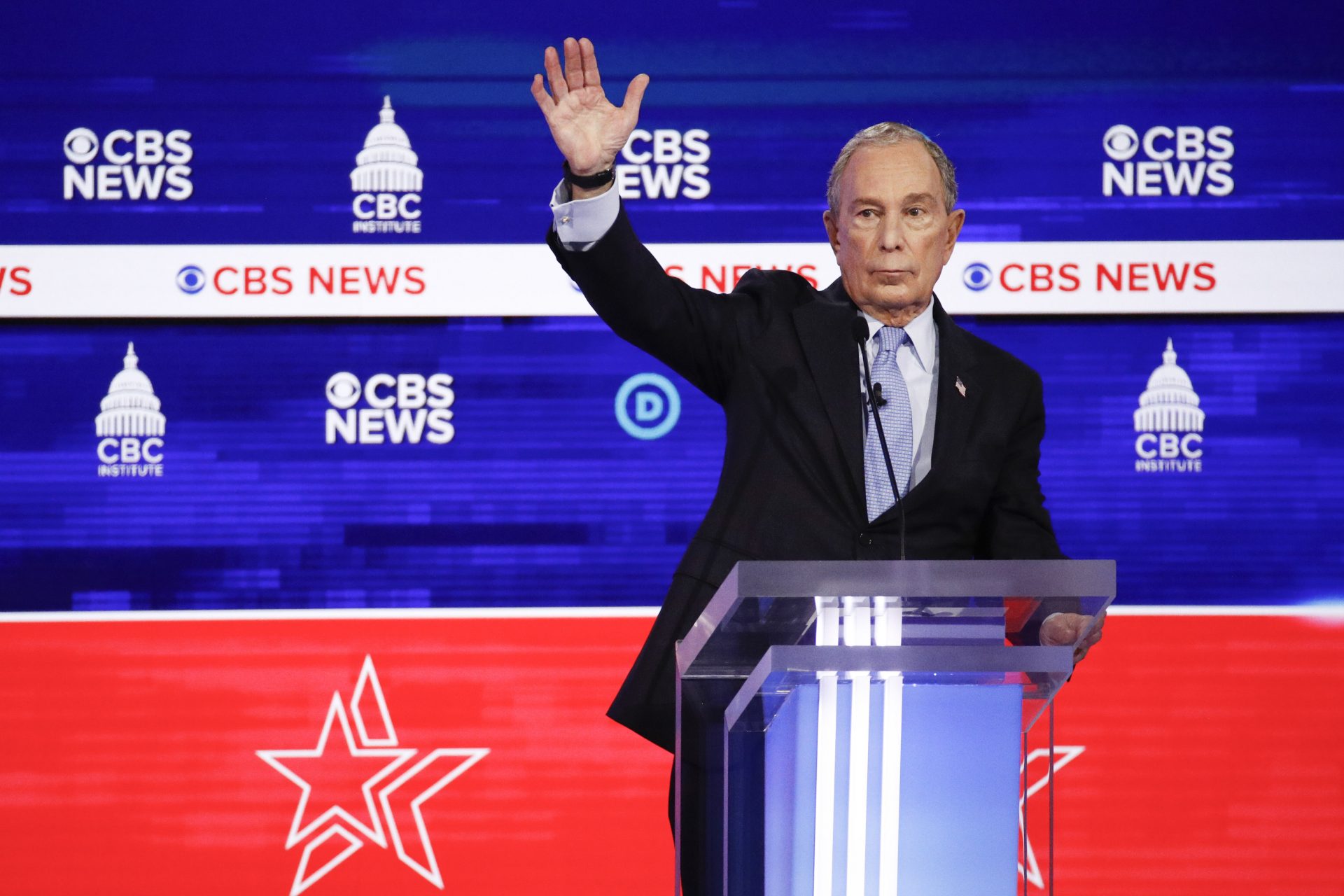 Democratic presidential candidates, former New York City Mayor Mike Bloomberg, raises his hand during the Democratic presidential primary debate at the Gaillard Center, Tuesday, Feb. 25, 2020, in Charleston, S.C., co-hosted by CBS News and the Congressional Black Caucus Institute.