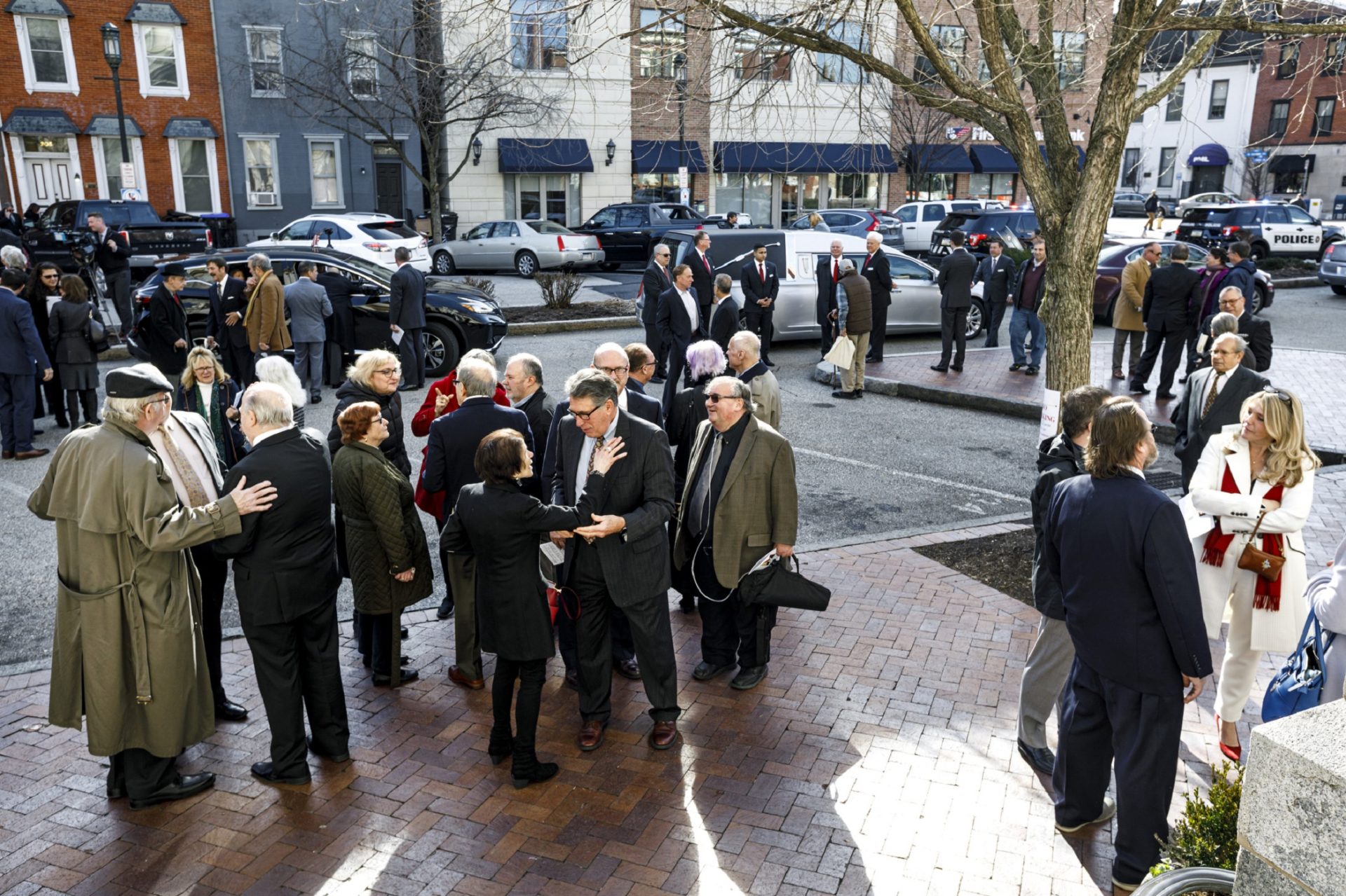 Former state Sen. Jeff Piccola talks, at center. Mourners talk after former Harrisburg Mayor Stephen Reed's funeral mass, which was held at St. Patrick Cathedral in Harrisburg, February 3, 2020. Reed died Jan. 25 at age 70 after a long battle with cancer.