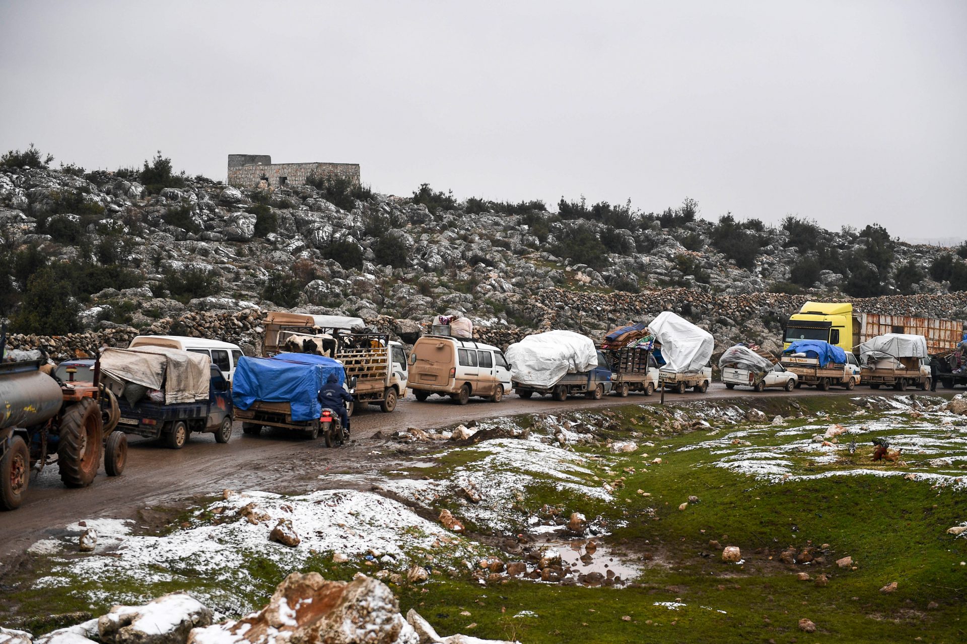 Syrian civilians flee from Idlib, seeking safety from the fighting that began escalating in December. The photo was taken on February 13.