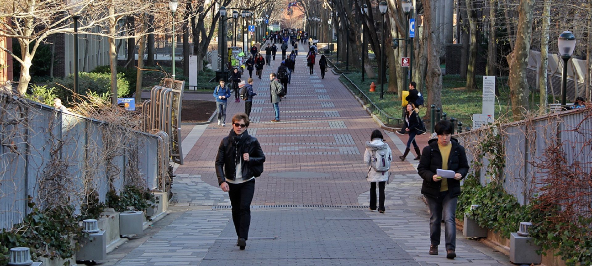 FILE PHOTO: People walk along Locust Walk on the University of Pennsylvania campus in West Philadelphia.