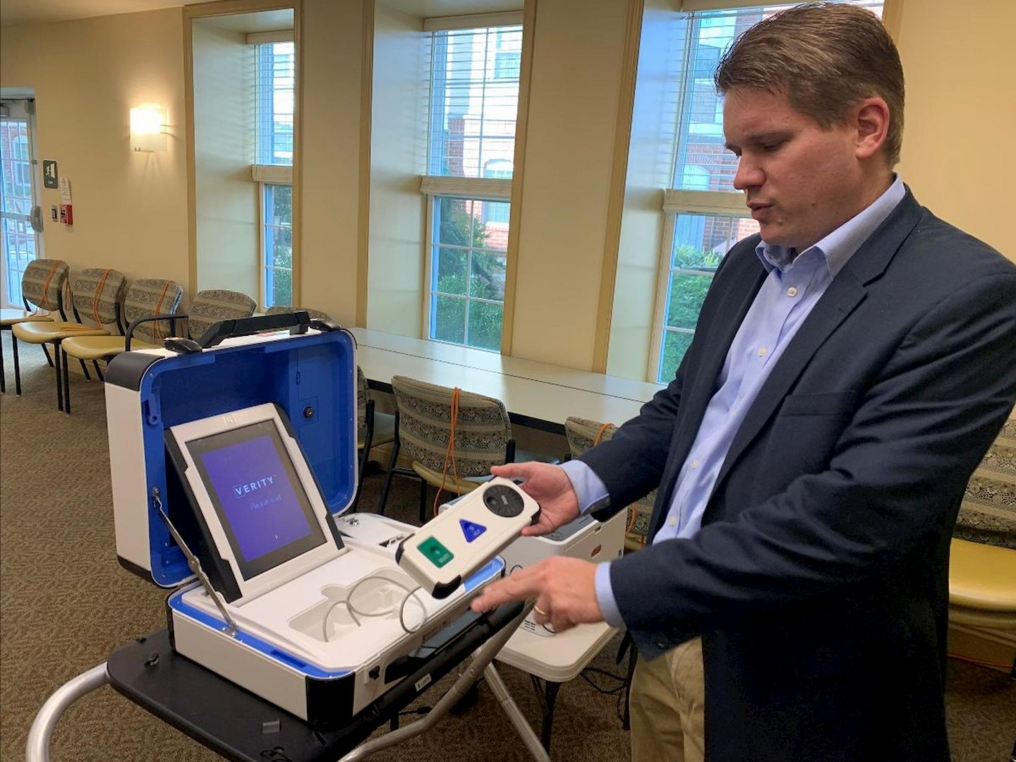 Randall Wenger, Lancaster County’s chief elections clerk, explains features of the county’s Hart InterCivic Verity Voting system at a demonstration last fall. (Emily Previti/PA Post)