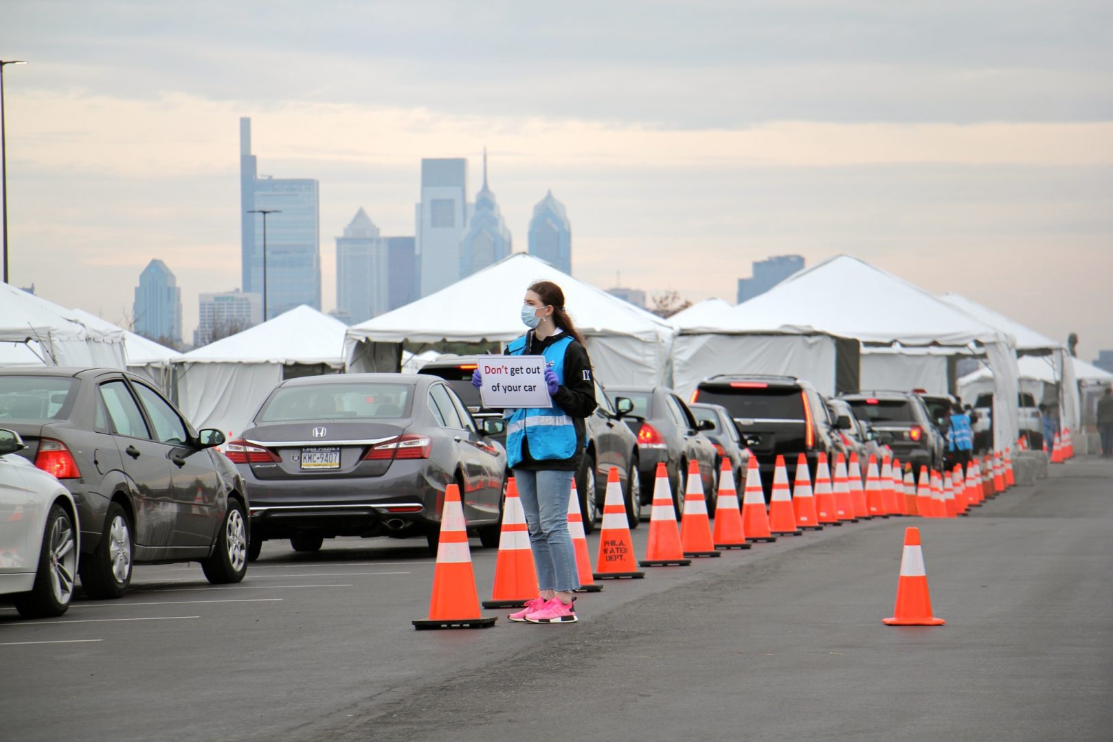 Cars line up at a drive through coronavirus test station in the parking lot at Citizens Bank Park.