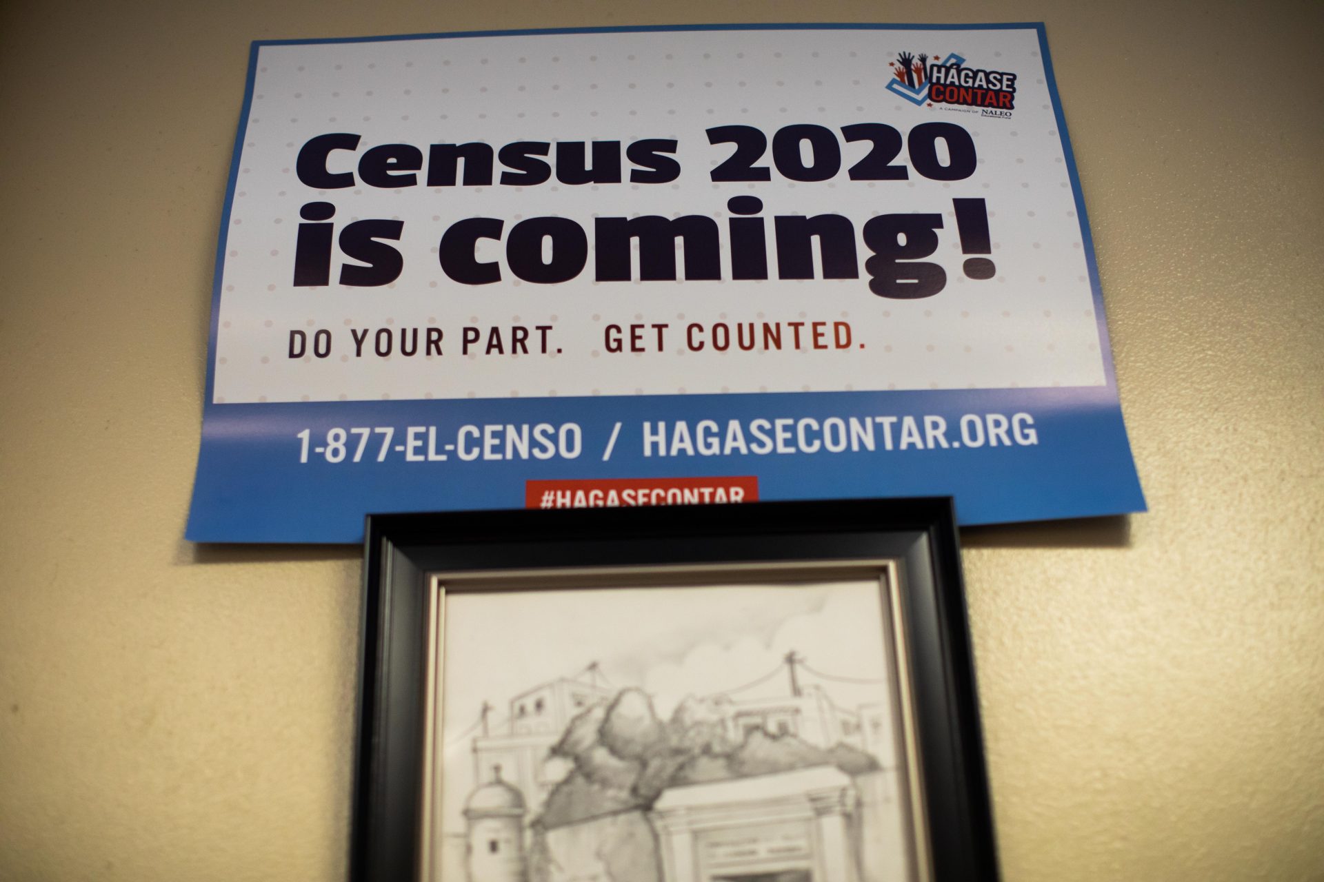 Signs posted around the offices of Ceiba in Norris Square, Kensington encourage visitors to participate in the 2020 census.