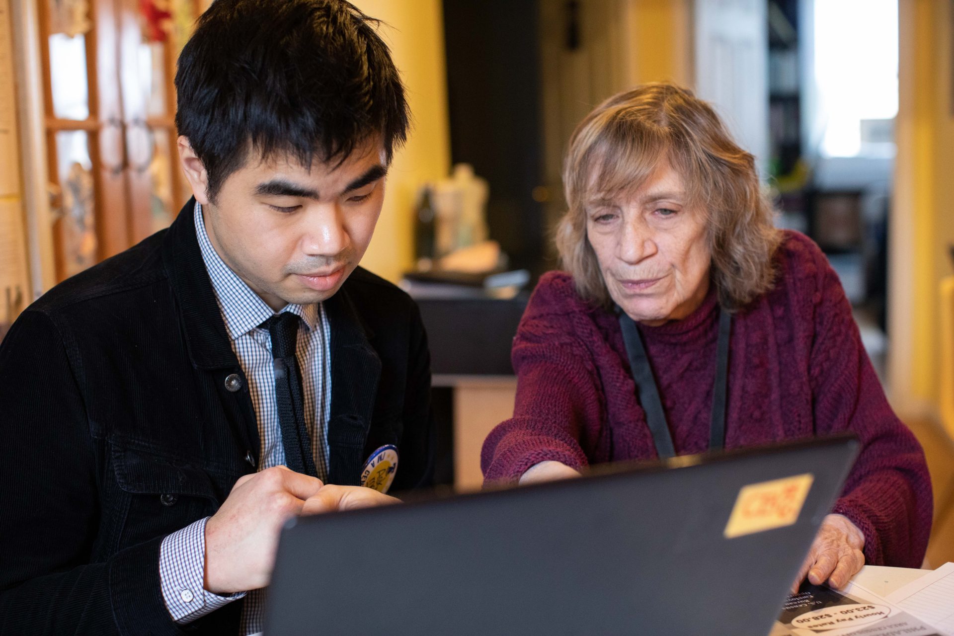 Jaime Moy of Northeast Philadelphia (left) applies for a census job with the help of Helene Berger of the U.S. Census Bureau.