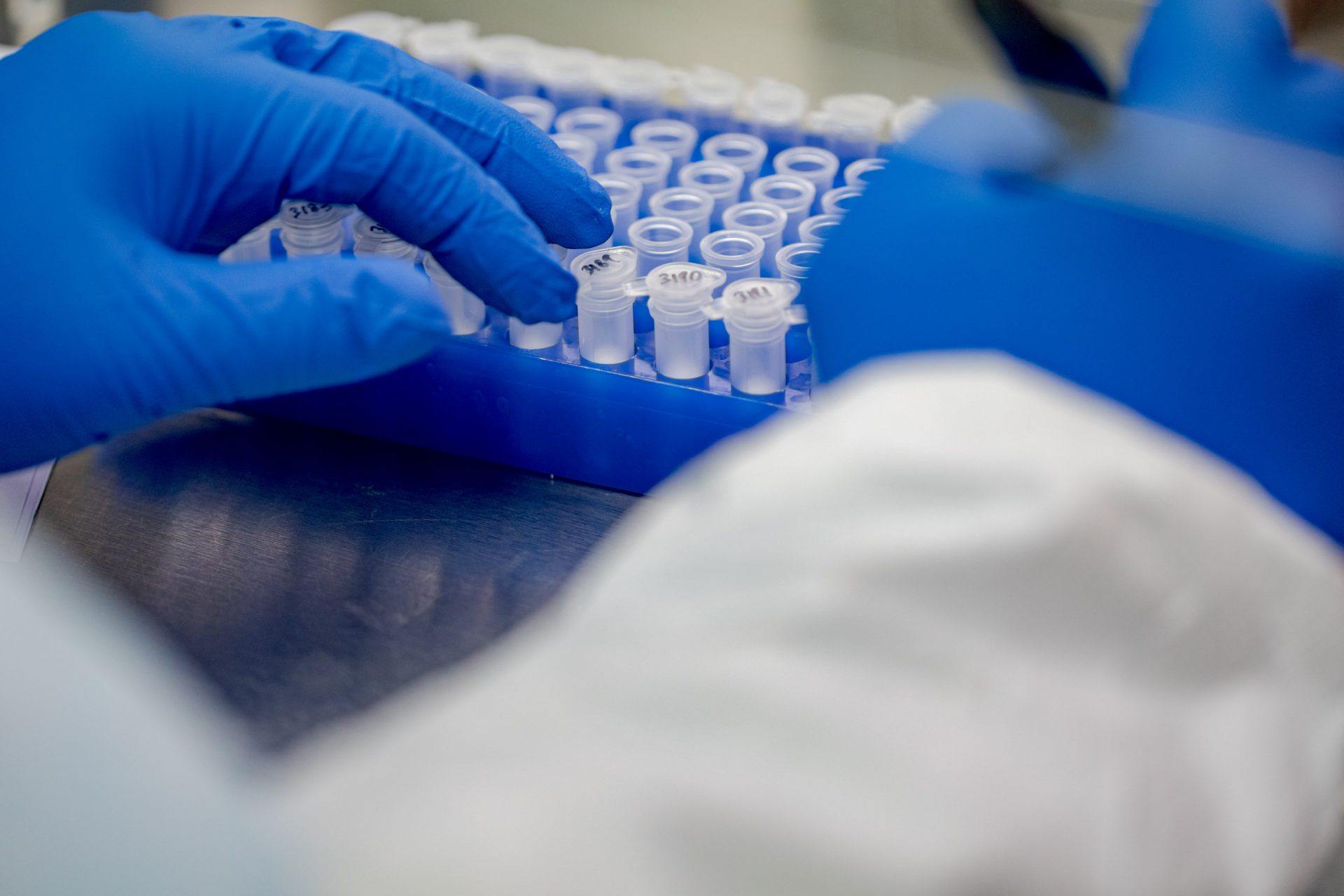 Pennsylvania Commonwealth microbiologist Kerry Pollard performs a manual extraction of the coronavirus inside the extraction lab at the Pennsylvania Department of Health Bureau of Laboratories on Friday, March 6, 2020.