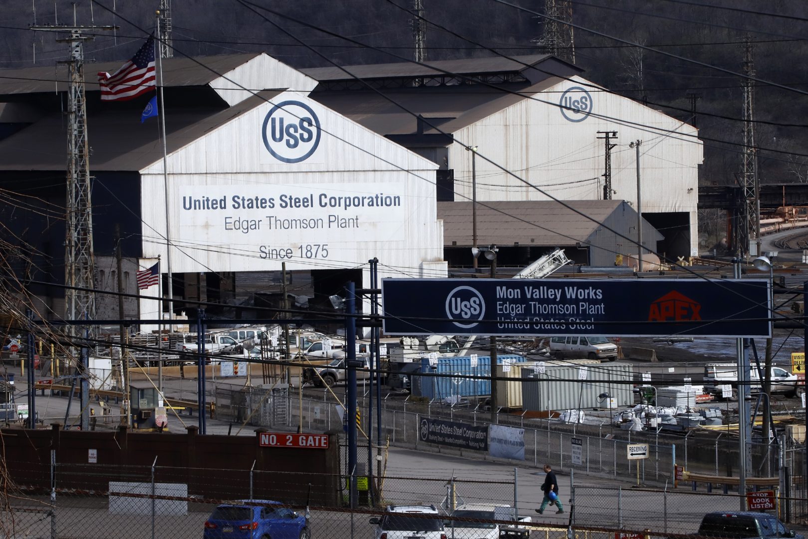 A worker leaves the U.S Steel Edgar Thomson Works in Braddock, Pa., Thursday, March 26, 2020. The plant was exempted from Pennsylvania Gov. Tom Wolf's order on Monday for 