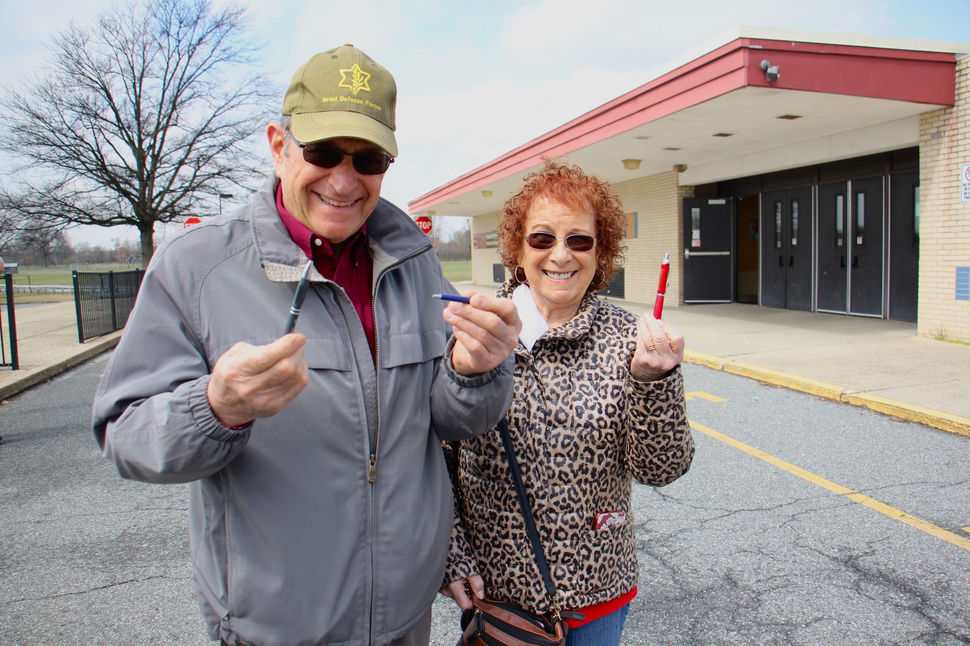 Bensalem voters Toby (right) and Stuart Kahn brought their own pens to Cecelia Snyder Middle School to vote in a special election for the district’s representative in the Pennsylvania House.