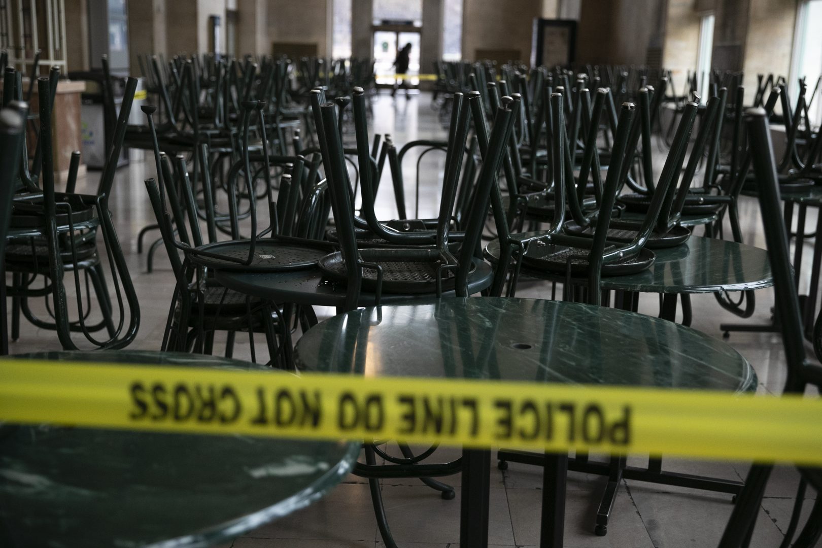 Chairs and tables are stacked inside the food court of 30th Street Station in Philadelphia on Tuesday, March 17, 2020. Pennsylvania Gov. Tom Wolf has ordered the statewide shutdown of nonessential Pennsylvania businesses for the next 14 days, while in Philadelphia Mayor Jim Kenney announced Monday a similar policy for the city due to the spread of the coronavirus. Restaurants will have to be take-out only. HEATHER KHALIFA / Philadelphia Inquirer