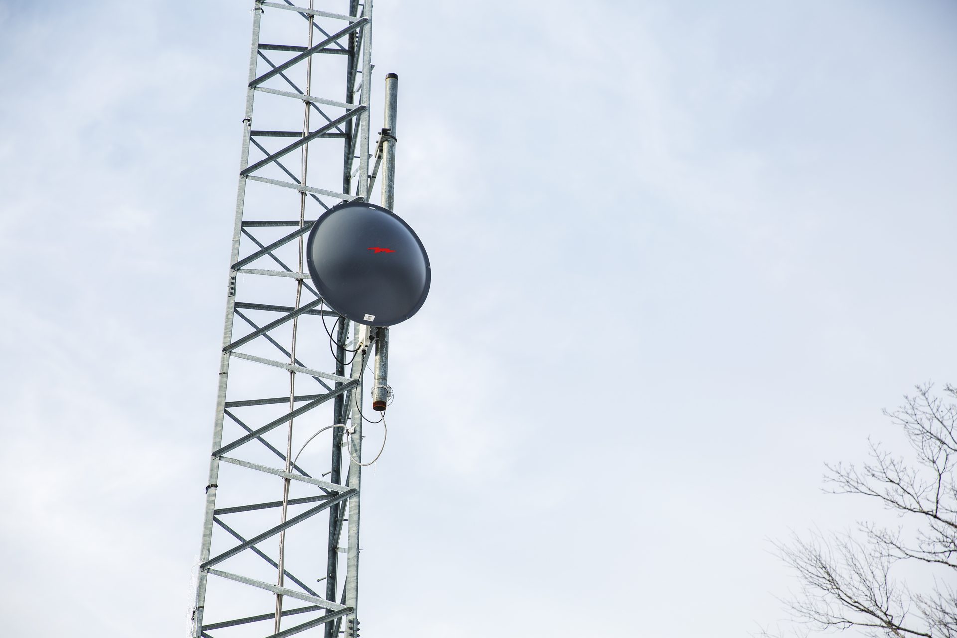 This specific receiver mounted on the radio tower points at another radio dish at Allensville, where a nearby fibre optic network turns into radio signal.