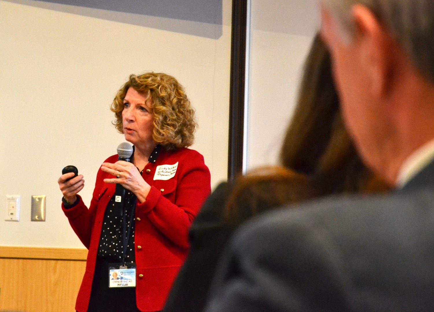 Infectious disease specialist Dr. Cynthia Whitener leads the crowd through a presentation at Penn State Hershey Mon., March 9, 2020. 