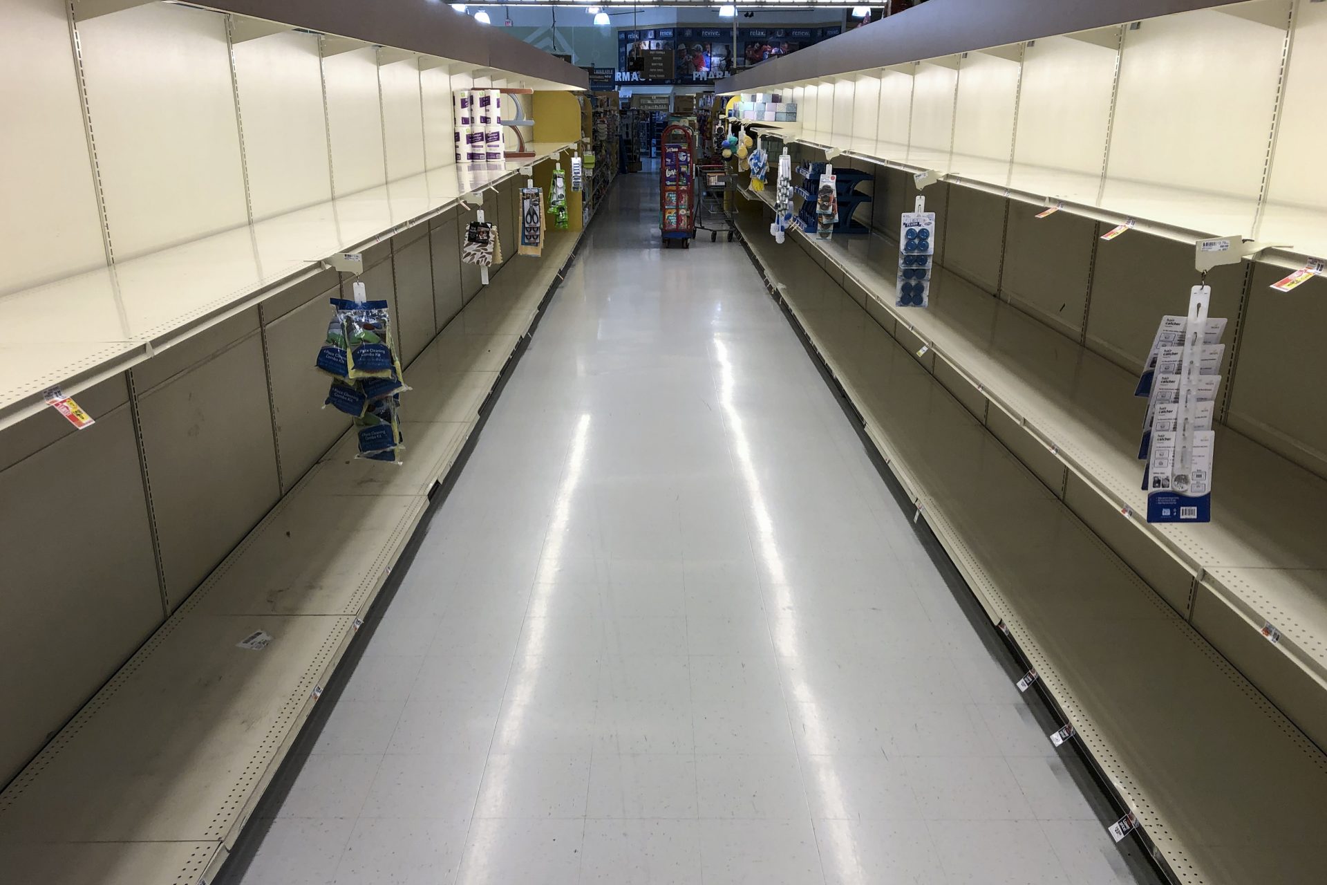 This Monday, March 16, 2020 photo shows empty shelves at a grocery store in Willow Grove, Pa., Shoppers have been buying up extra quantities of the products since the outbreak of the coronavirus. According to the World Health Organization, most people recover in about two to six weeks, depending on the severity of the illness.