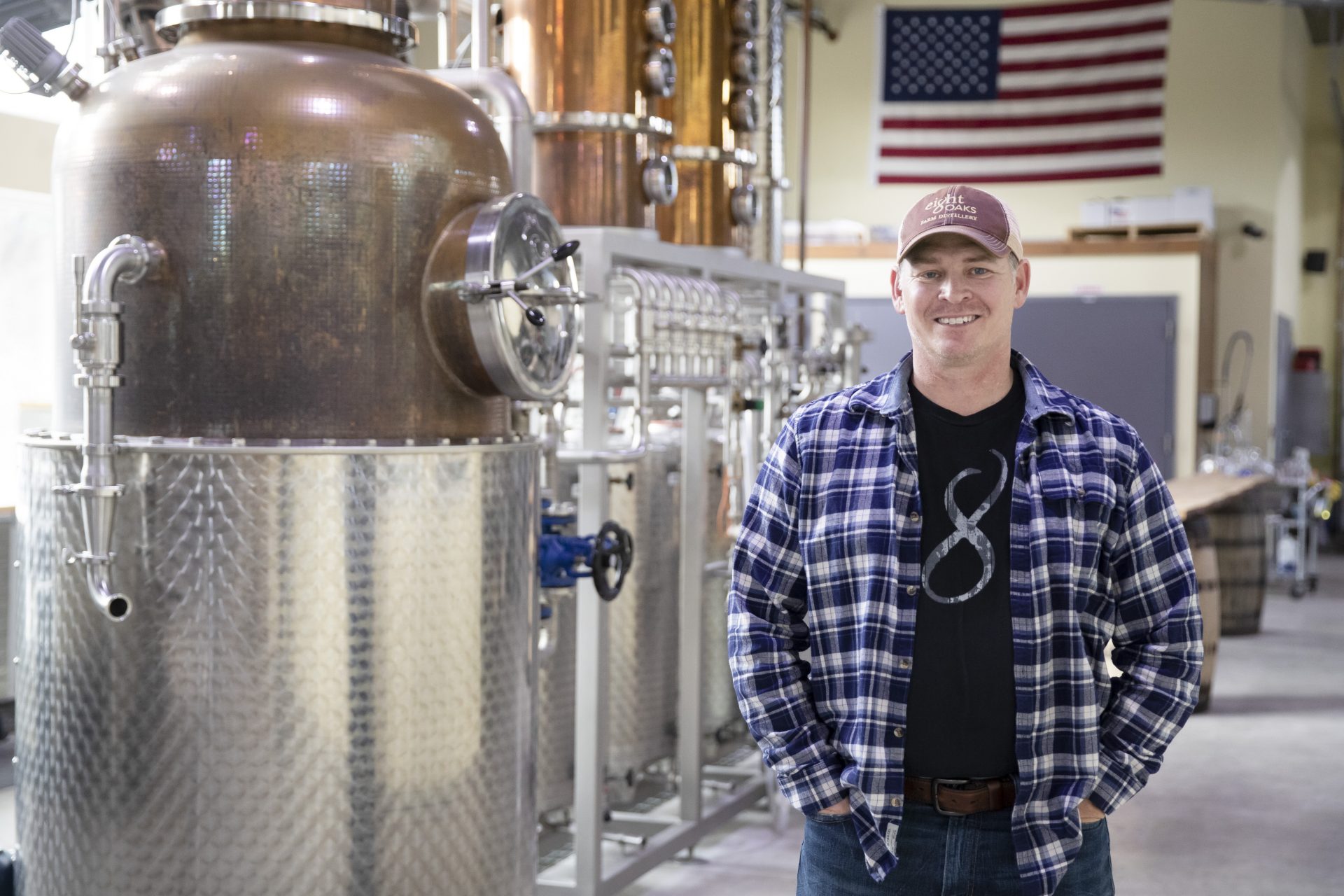 Chad Butters, founder of Eight Oaks Farm Distillery, poses for a photo at their facility in New Tripoli, Pa., Monday, March 16, 2020. Butters, who grew increasingly angry as he saw the skyrocketing price of hand sanitizer, has decided to do something about it: He's temporarily converting his operation into a production line for the suddenly hard-to-find, gooey, alcohol-based disinfectant.
