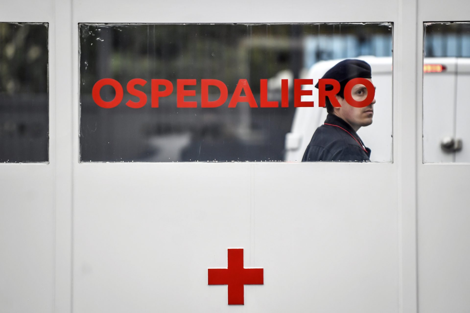 A Carabinieri (Italian paramilitary police) officer on patrol at former military hospital Baggio, which reopened a ward to hospitalize patients recovering from the COVID-19 virus, in Milan, Italy, Tuesday, March 2, 2020. The strain on Lombardy's health system has forced authorities to seek to bring doctors out of retirement, accelerate graduation dates for nursing students, and incorporate doctors and hospital beds from the private sector to ease the strain on public hospitals.