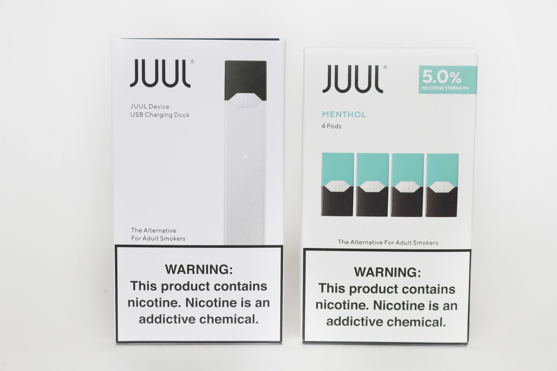 An electronic cigarette and menthol pods packaging from Juul Labs are seen on Tuesday, Feb. 25, 2020, in Pembroke Pines, Fla.
