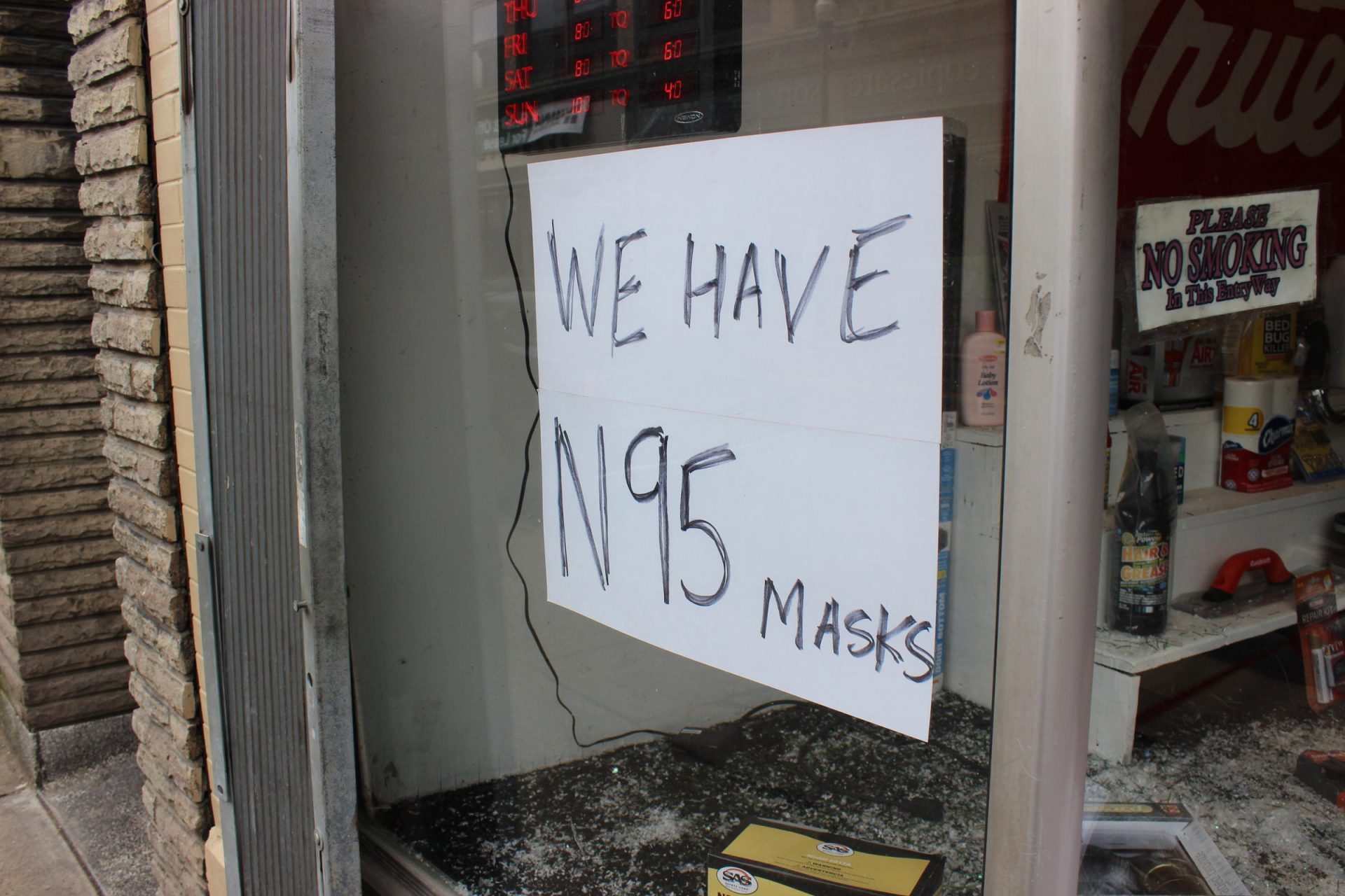 Sign at Volt True Hardware In Pittsburgh on Monday, March 2, 2020, advertising face masks.