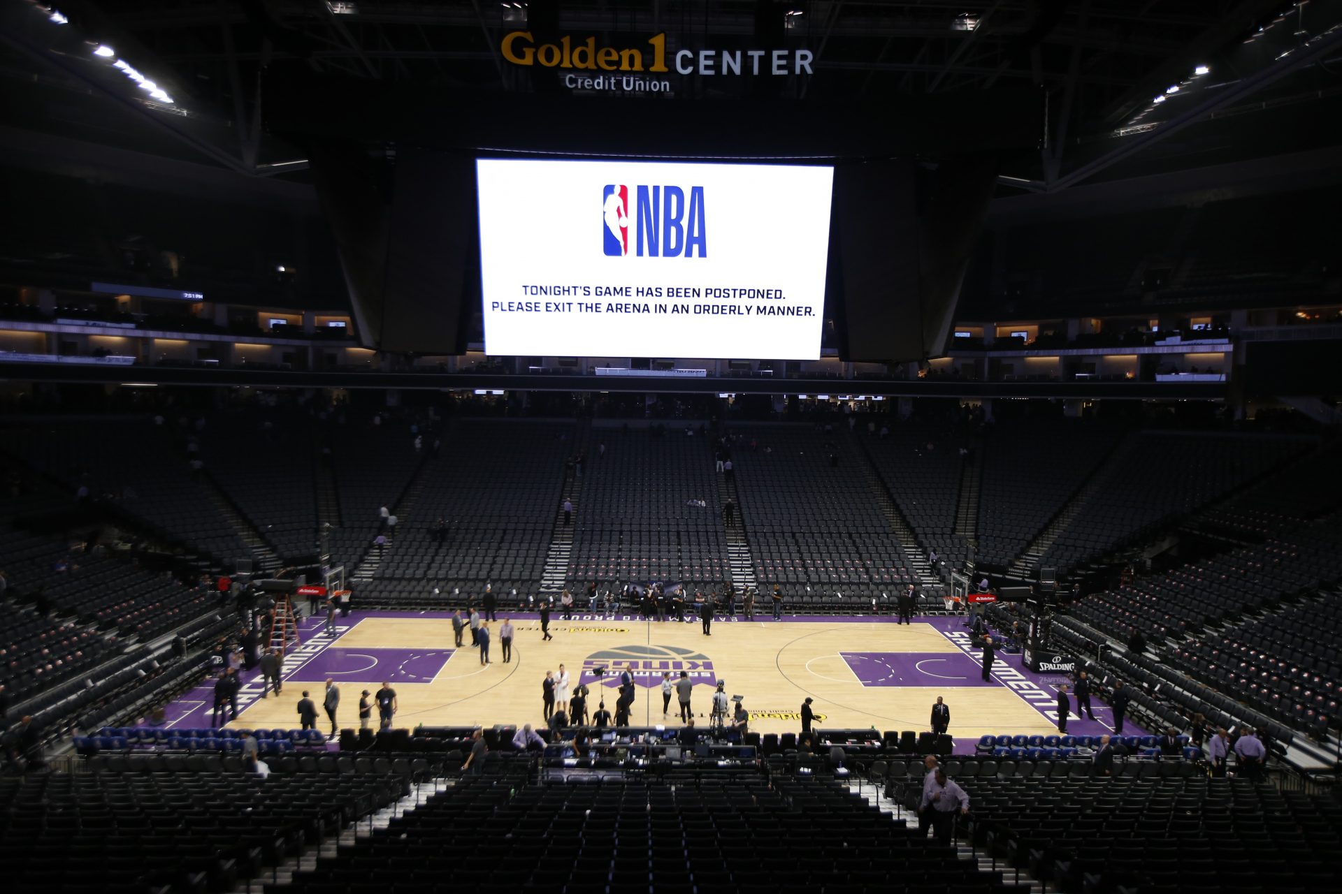 The Golden 1 Center center empties out after the NBA basketball game between the New Orleans Pelicans and Sacramento Kings was postponed at the last minute in Sacramento, Calif., Wednesday, March 11, 2020. The postponement was due to what the league said was an "abundance of caution," because official Courtney Kirkland, who was scheduled to work the game, had worked the Utah Jazz game earlier in the week. A player for the Jazz tested positive for the coronavirus.
