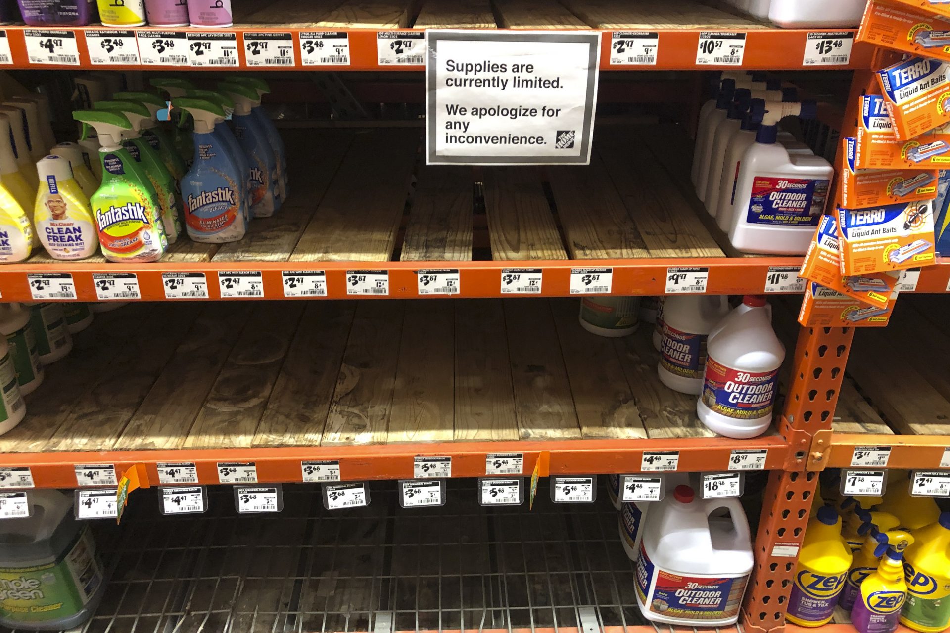 Shelves that once supported an abundance of cleaning supplies lay sparse at a Home Depot in Warrington, Pa., Tuesday, March 17, 2020.