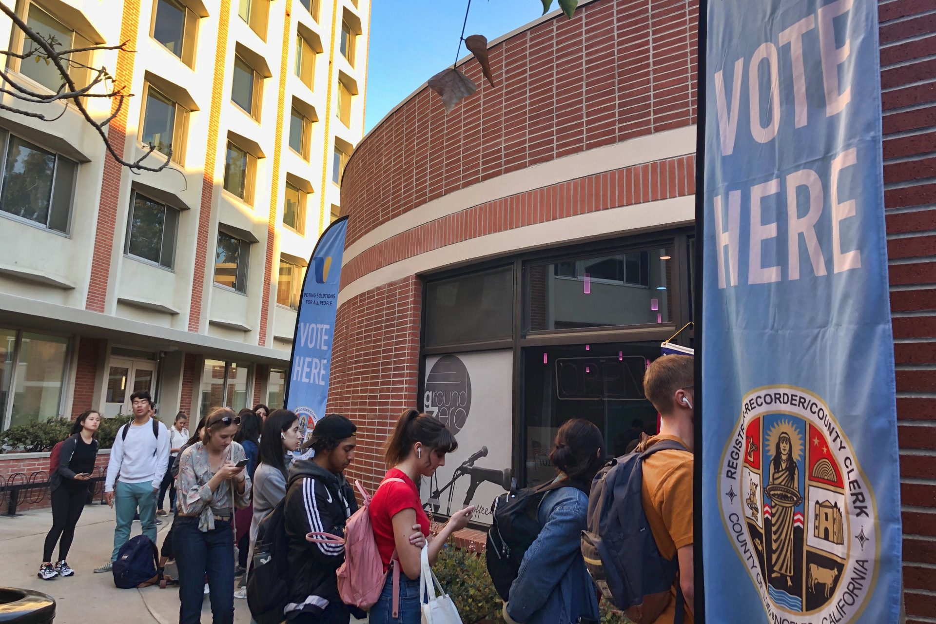 Voters wait on line at a polling station at the University of Southern California on Tuesday, March 3, 2020. Some California voters are waiting in long lines because of technical glitches connecting to the statewide voter database or too many users trying to cast ballots at once. The secretary of state's office said election workers in 15 counties could not connect to the statewide voter registration database on Super Tuesday but that the issues have been resolved