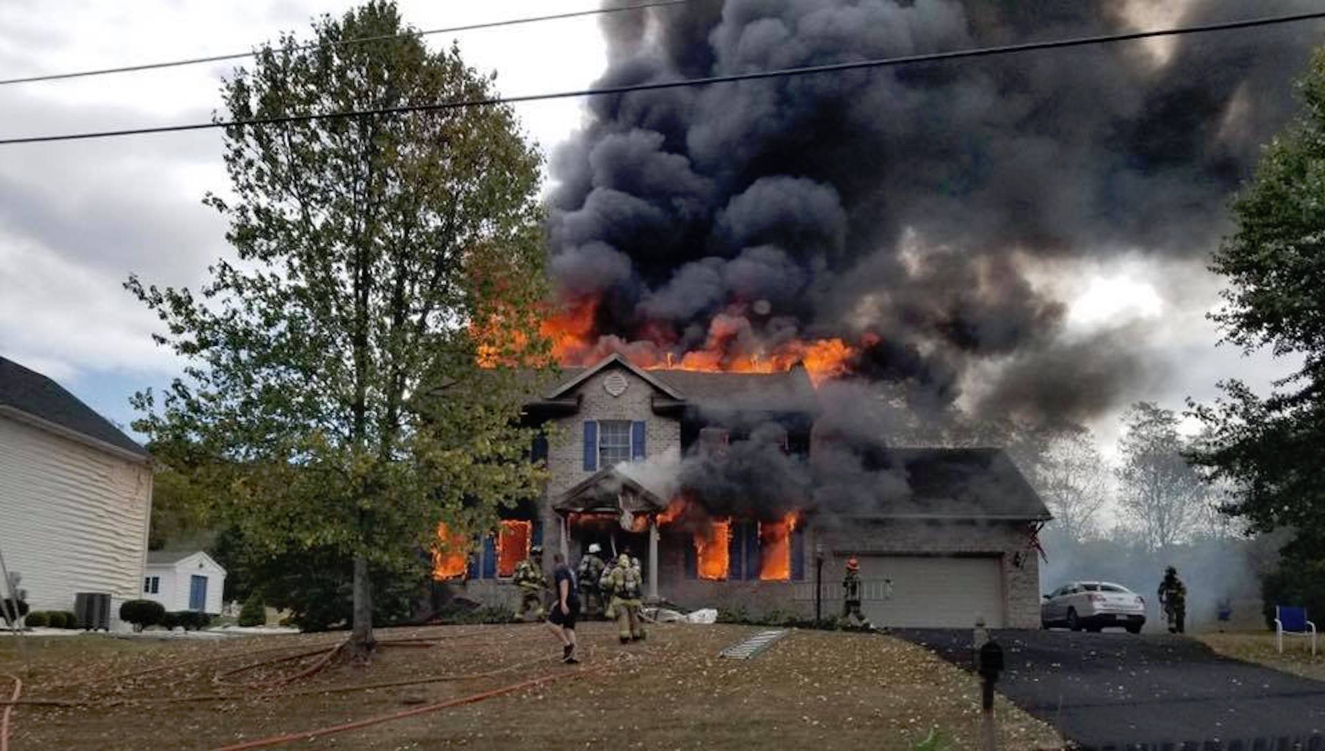 Dan and Heather Adamson's house in Hamilton Township was destroyed by fire in September. The reconstruction of their home has been held up by Gov. Tom Wolf's business closure order.