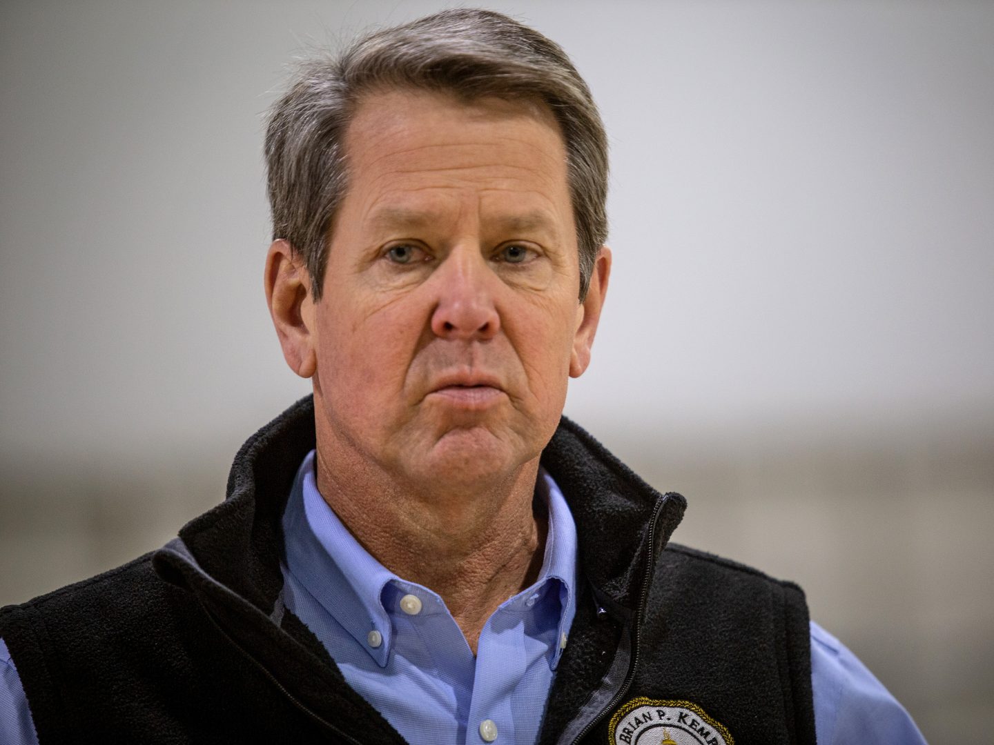 Georgia Gov. Brian Kemp, pictured on April 16, insists he is moving forward with plans to allow some nonessential businesses to open their doors to the public. The plan has come under intense criticism.